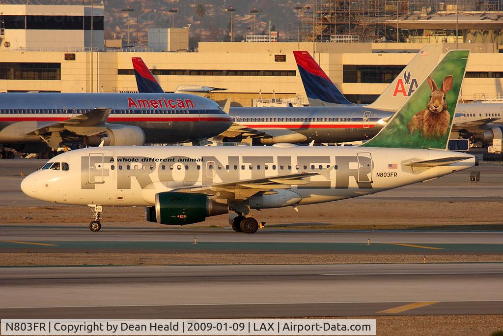 N803FR, 2003 Airbus A318-111 C/N 2017, 'Stu' the Eastern Cottontail is a cool rabbit. He always seems to be looking for spotters. Seen here holding short of RWY 25R as FLT FFT417 after arriving on RWY 25L from Denver Int'l (KDEN).