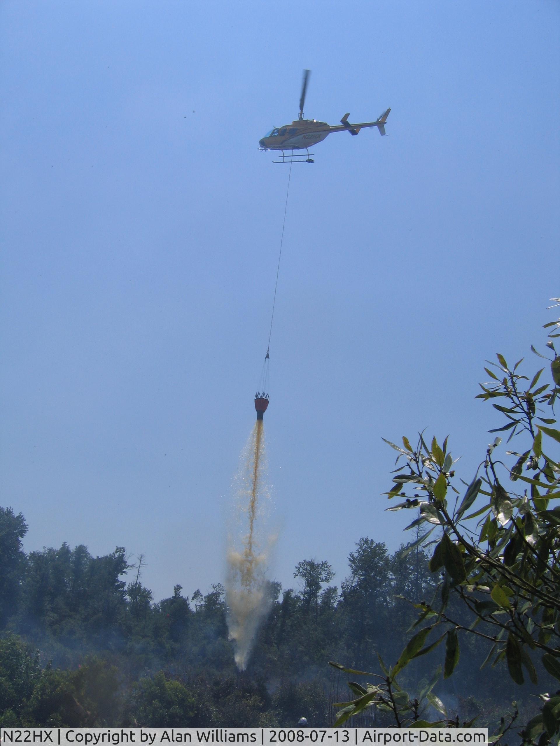N22HX, 2007 Bell 206L-4 LongRanger IV LongRanger C/N 52348, N22HX dumping dirty swamp water on the South One Fire in the Great Dismal Swamp 2008.