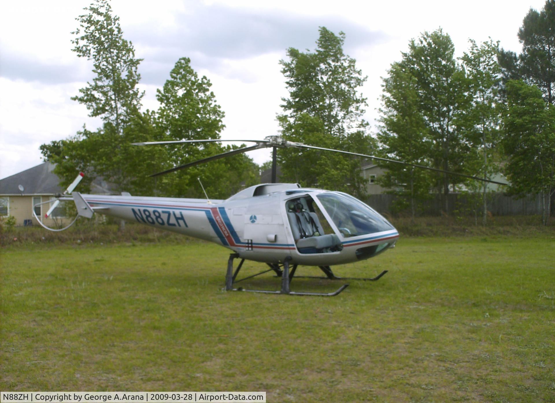 N88ZH, Enstrom 280FX Shark C/N 2023, Static display at the community college sports field
