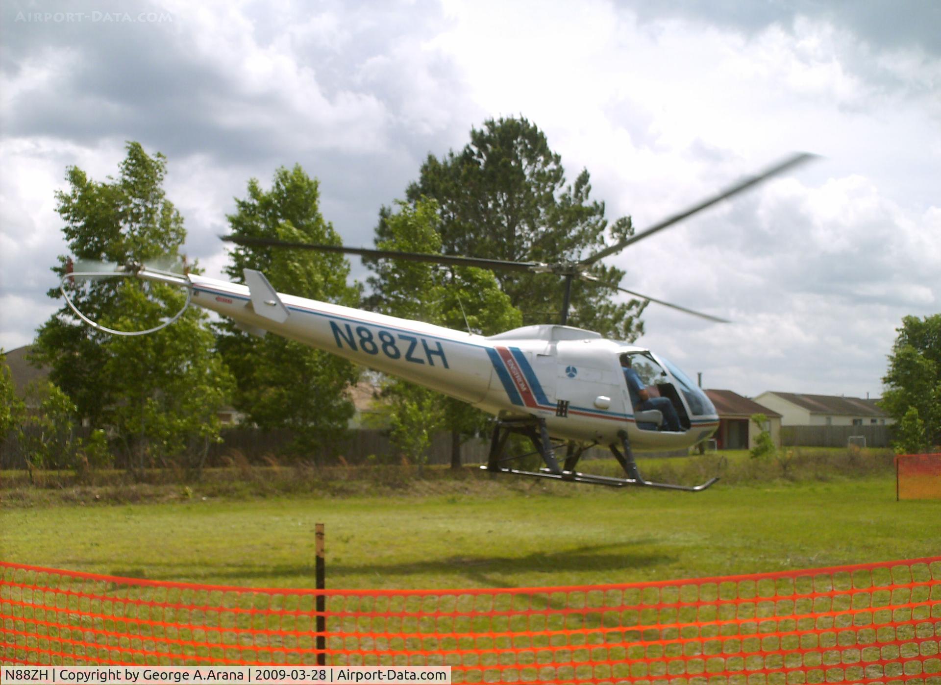 N88ZH, Enstrom 280FX Shark C/N 2023, Static display at the community college sports field