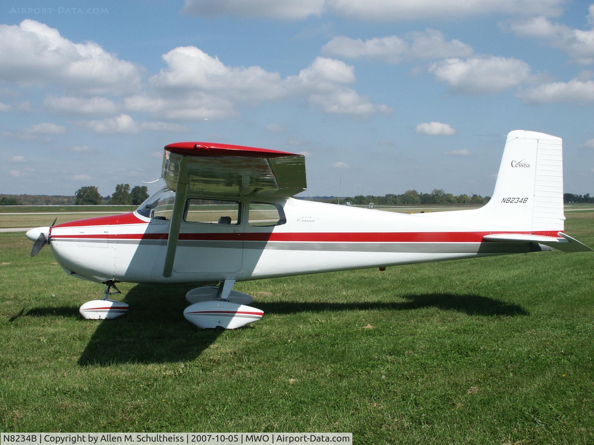 N8234B, 1957 Cessna 172 C/N 36034, White plane in bright Sun