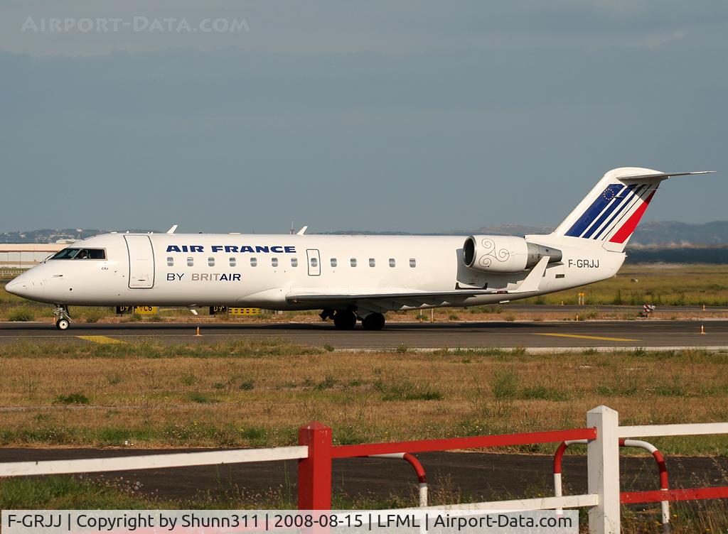 F-GRJJ, 1997 Canadair CRJ-100ER (CL-600-2B19) C/N 7190, Taxiing holding point rwy 32R for departure with new titles