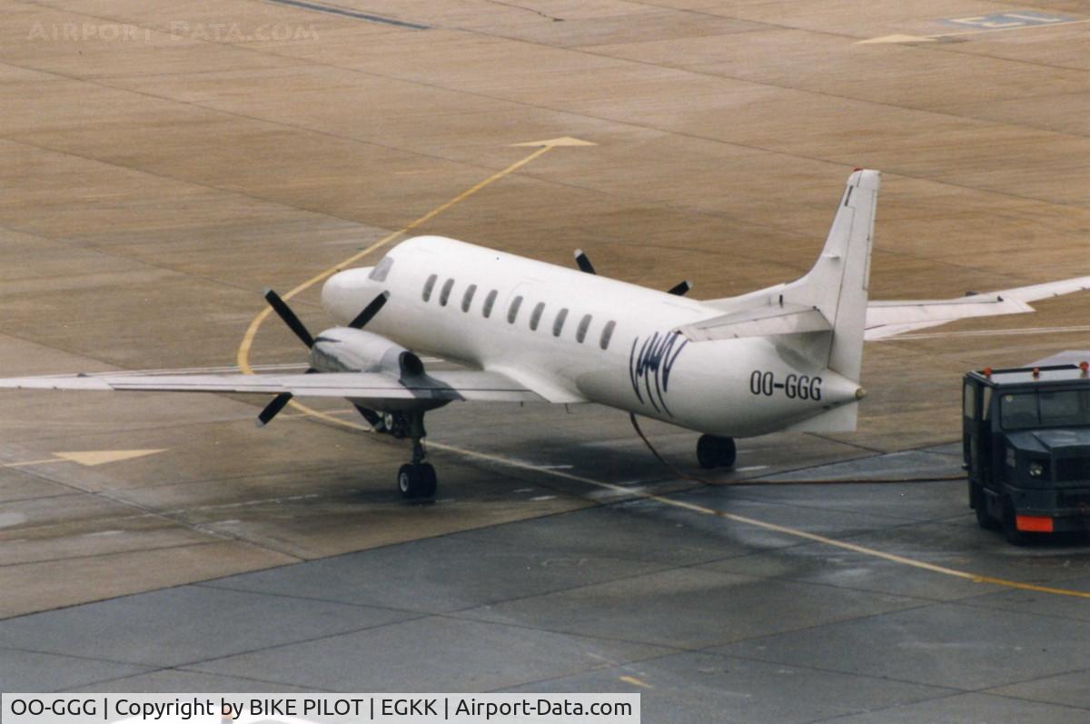 OO-GGG, 1987 Fairchild SA-227AC Metro III C/N AC-670B, SITTING AT A DAMP GATWICK