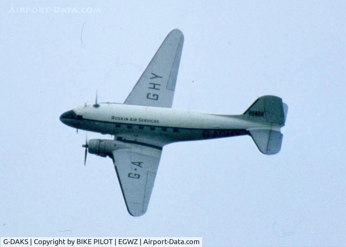 G-DAKS, 1943 Douglas C-47A-75-DL Skytrain C/N 19347, ALCONBURY AIRSHOW 1982 CARRYING RUSKIN AIR SERVICES TITLES AND FALSE REG. FOR TV SERIES 'AIRLINE'. G-AGHY IS IN FACT A TIGER MOTH