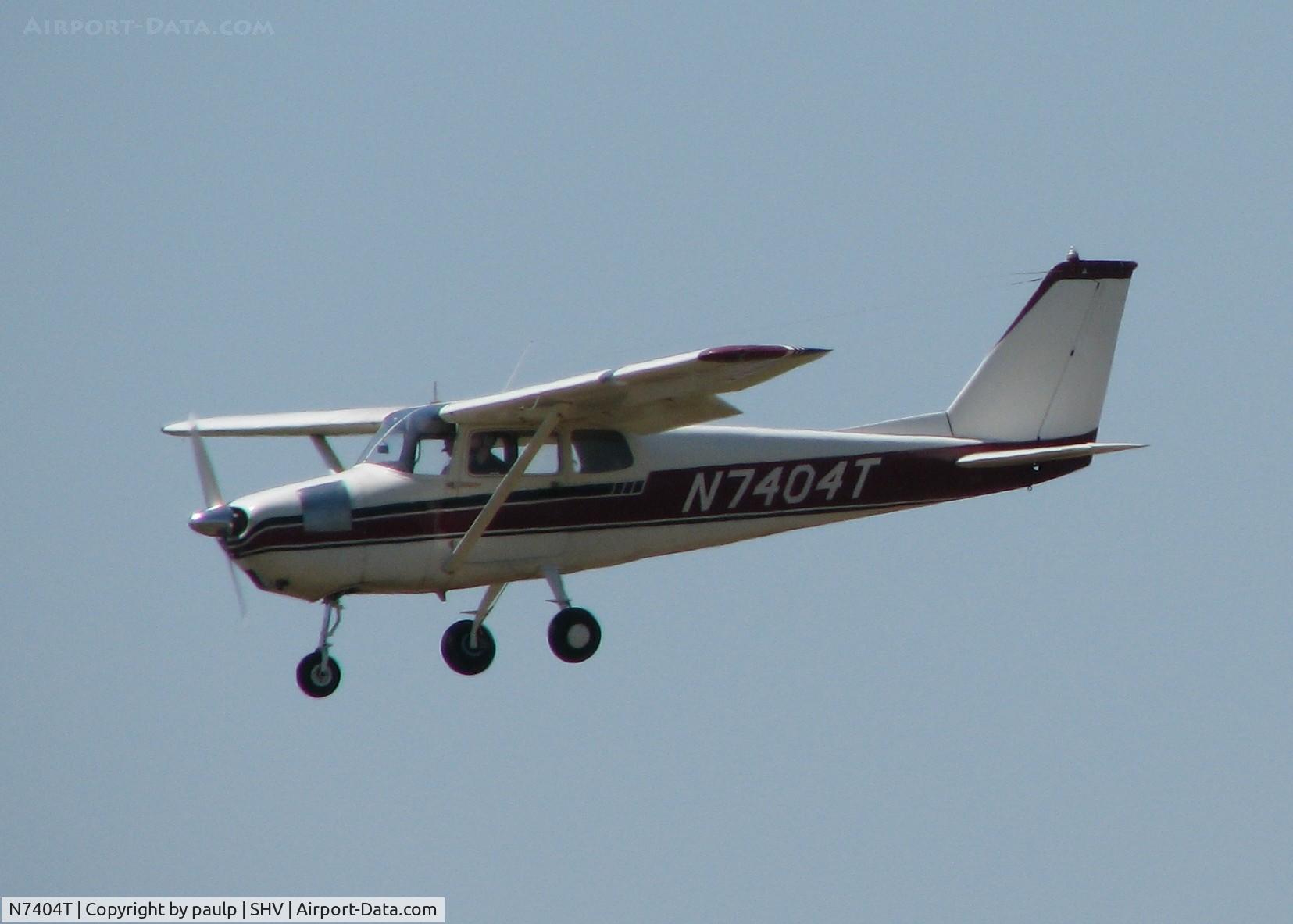 N7404T, 1959 Cessna 172A C/N 47004, Doing touch and goes on runway 14 at the Shreveport Regional airport.