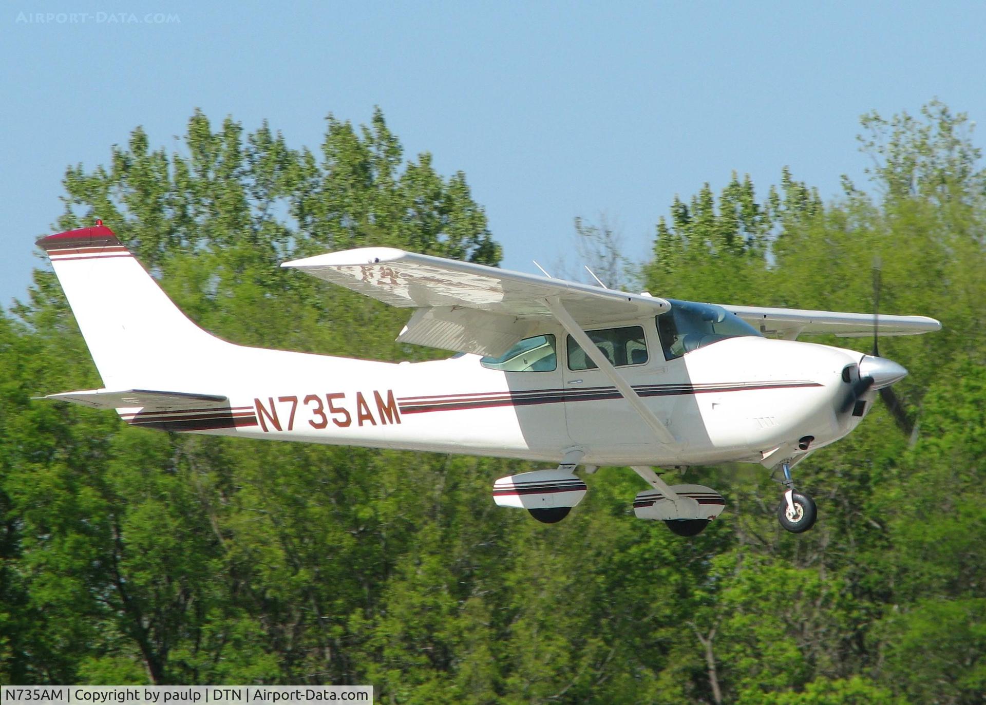 N735AM, 1976 Cessna 182Q Skylane C/N 18265271, Landing on 14 at Downtown Shreveport.