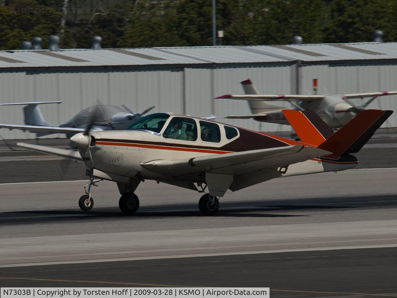 N7303B, 1954 Beech E35 C/N D-3766, N7303B arriving on RWY 21