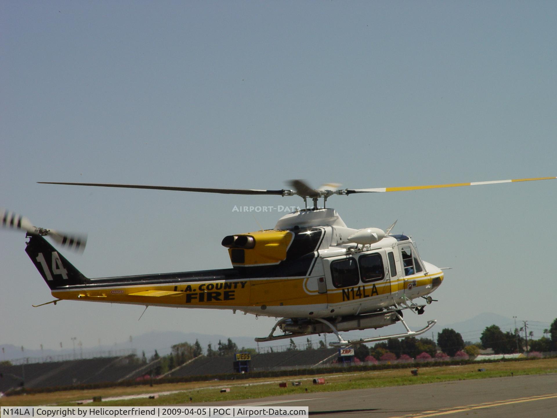 N14LA, 2005 Bell 412EP C/N 36393, Flaring out, getting ready to head south for the pad