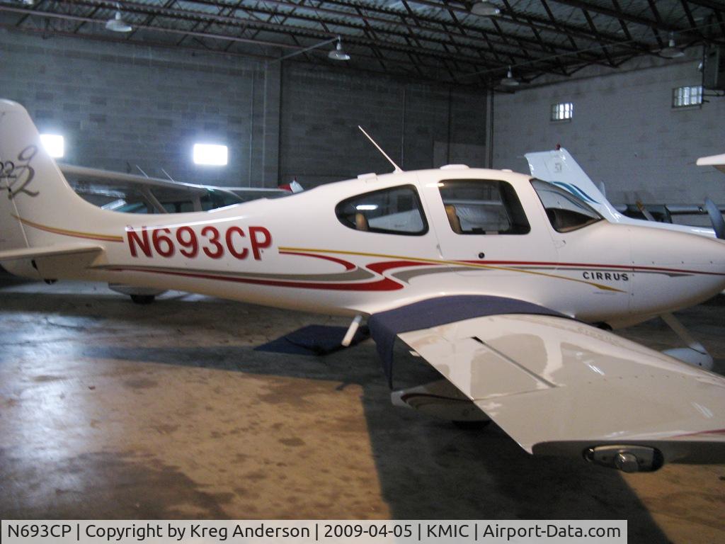 N693CP, 2004 Cirrus SR22 C/N 1181, Crowded hangar! Not enough room for a full pic. Oh well, nice plane though, huh?