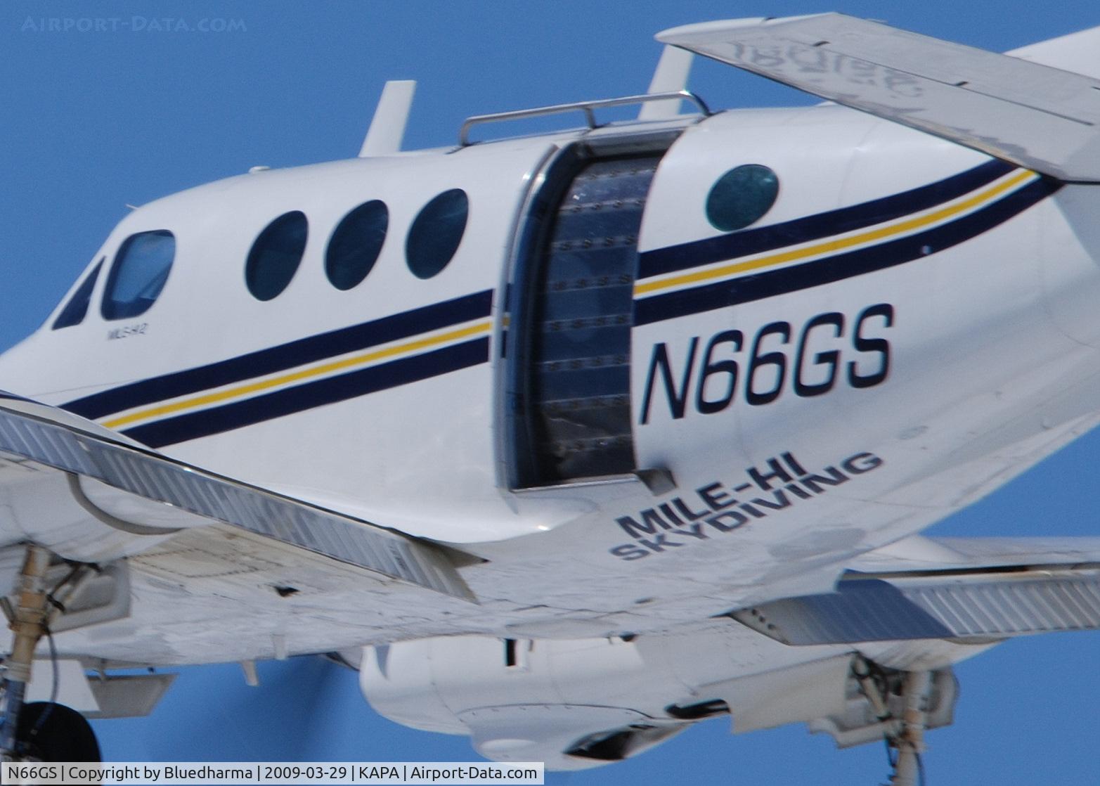 N66GS, 1967 Beech 65-A90 C/N LJ-237, Mile High Skydiving. On final approach to 17L.