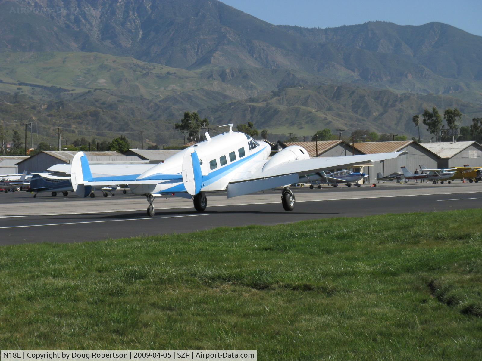 N18E, 1958 Beech E18S C/N BA-383, 1958 Beech SUPER E18S, two P&W R-985 Wasp Jr. 450 Hp each, old friend first photographed at EAA AirVenture 2008, landing roll Rwy 04