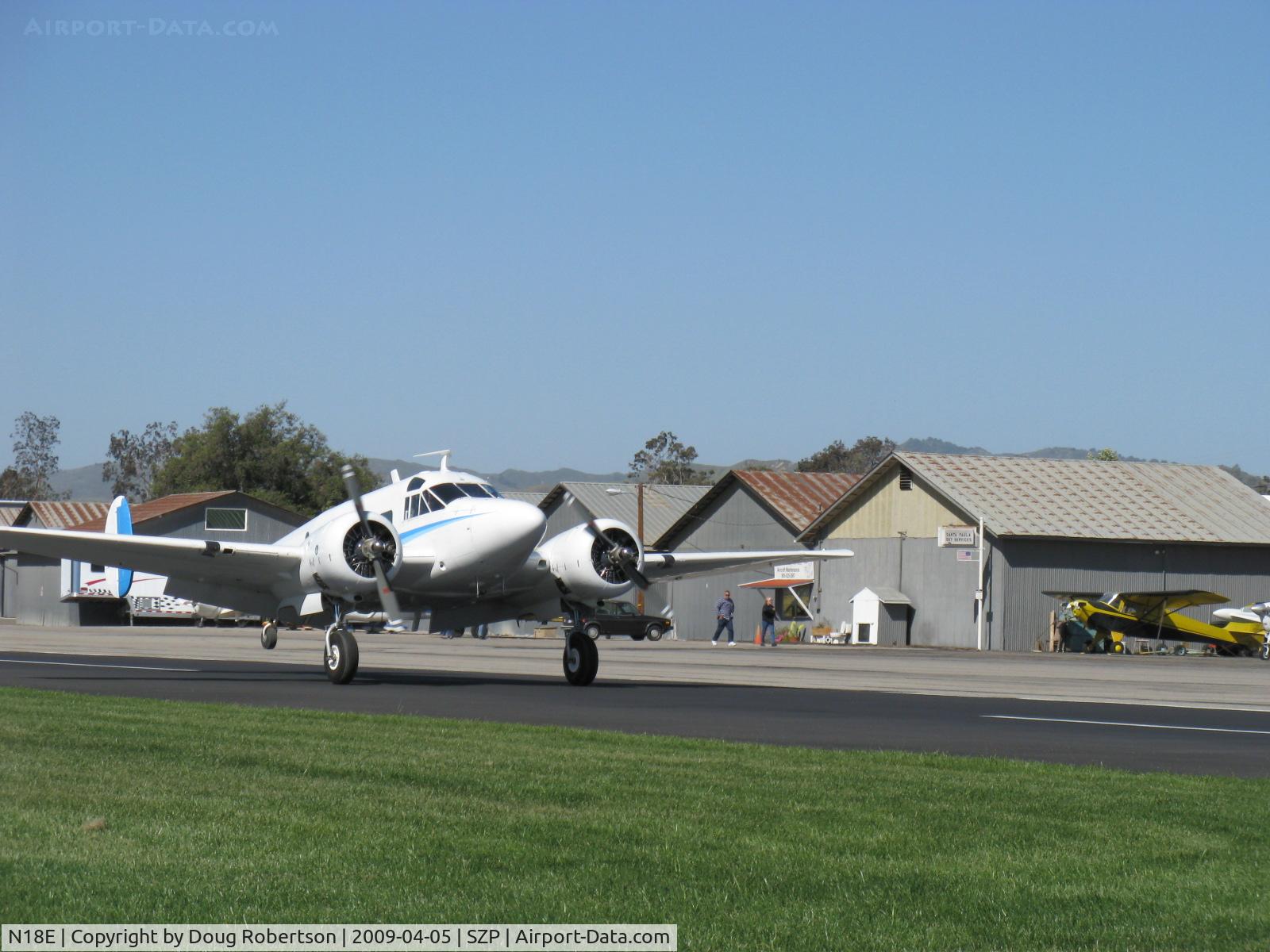 N18E, 1958 Beech E18S C/N BA-383, 1958 Beech SUPER E18S, two P&W R-985 Wasp Jr. 450 Hp each, old friend first photographed at EAA AirVenture 2008, landing roll Rwy 04