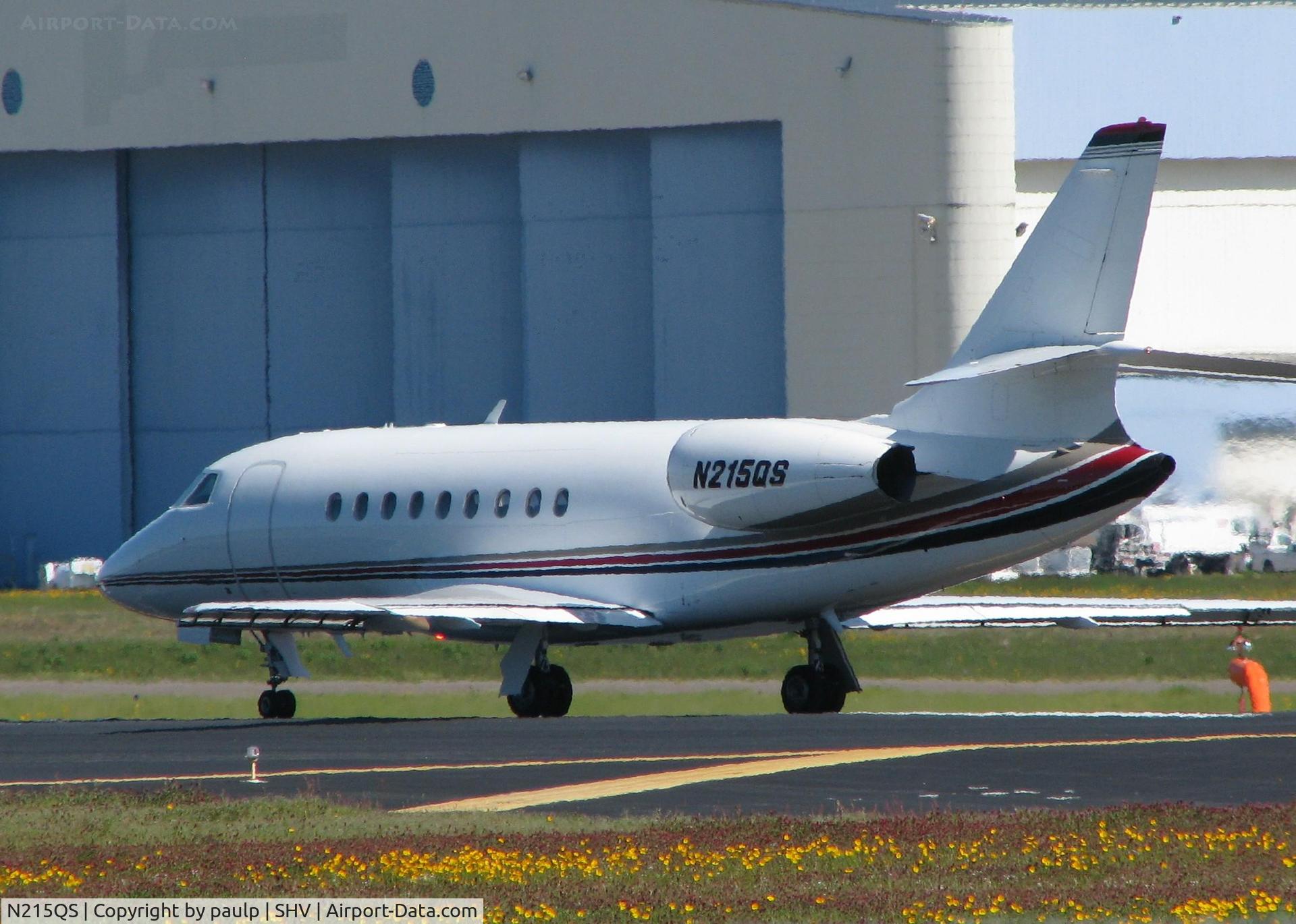 N215QS, 2004 Dassault Falcon 2000 C/N 214, Rolling for take off on 32 at Shreveport Regional.