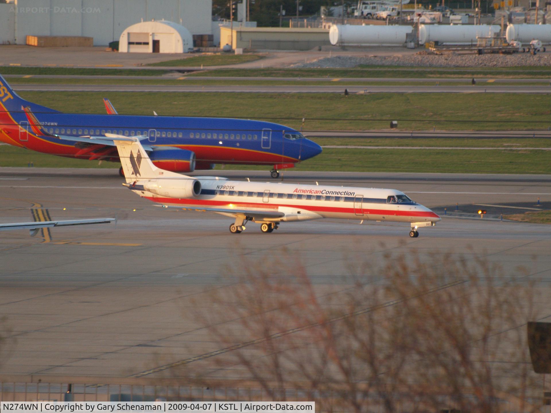 N274WN, 2007 Boeing 737-7H4 C/N 32529, PLANE IN BACKGROUND, JUST LANDED