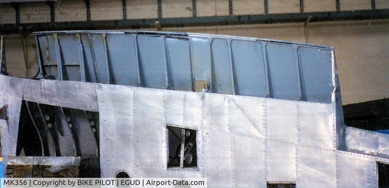 MK356, 1944 Supermarine 361 Spitfire LF.IXc C/N CBAF.IX.1561, UNDERSIDE OF RIGHT WING SHOWING WERE THE FLAP LOCATES.RAF ABINGDON EARLY 90'SS