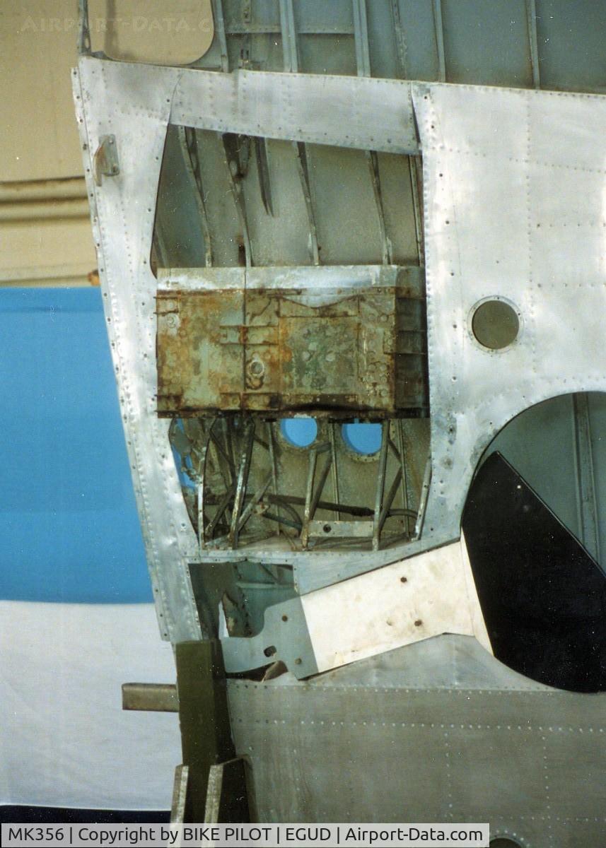 MK356, 1944 Supermarine 361 Spitfire LF.IXc C/N CBAF.IX.1561, WHEEL WELL WITH DOOR IN PLACE AND RADIATOR.RAF ABINGDON EARLY 90'S