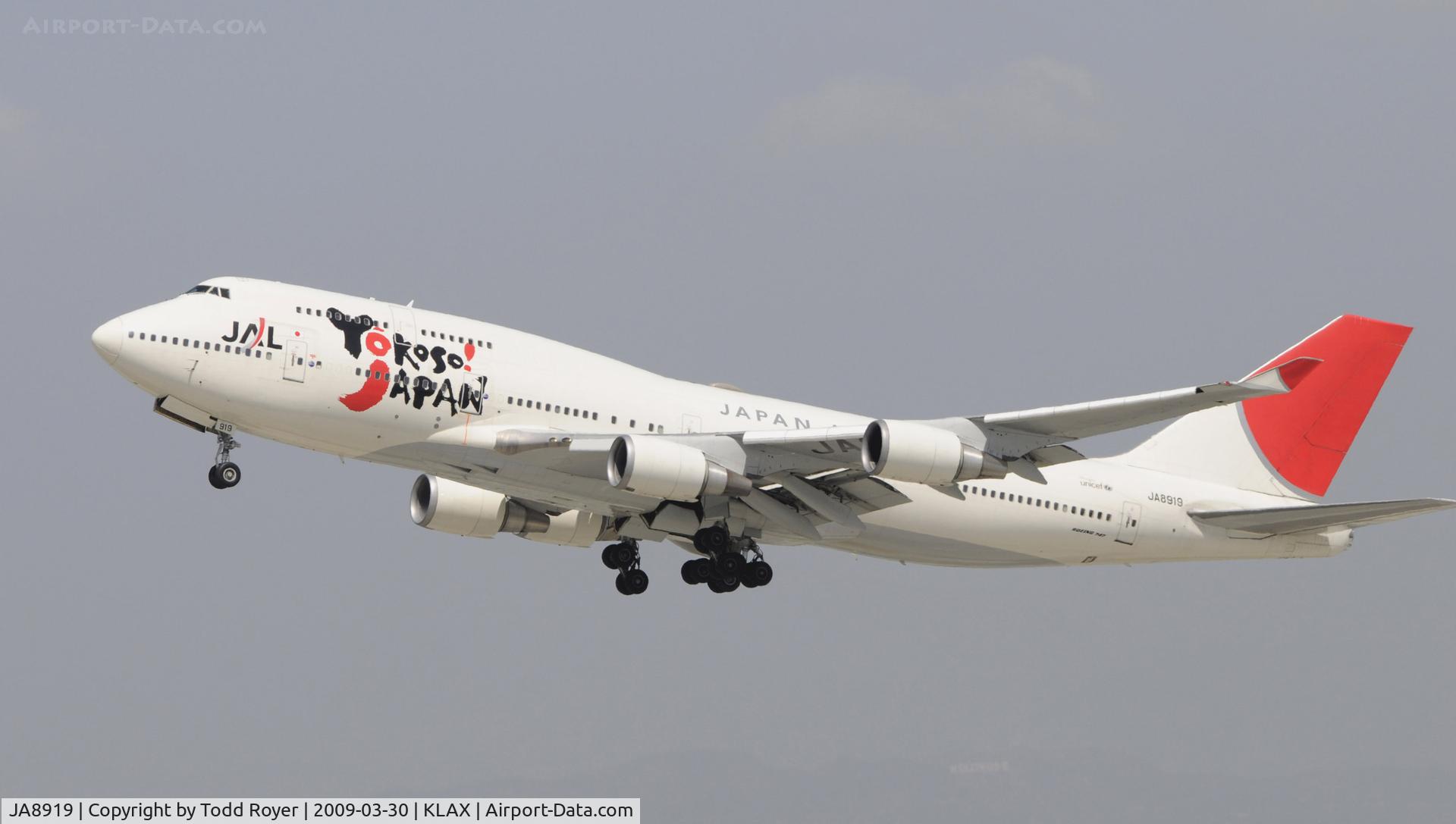 JA8919, 1999 Boeing 747-446 C/N 27100, Departing LAX on 25R