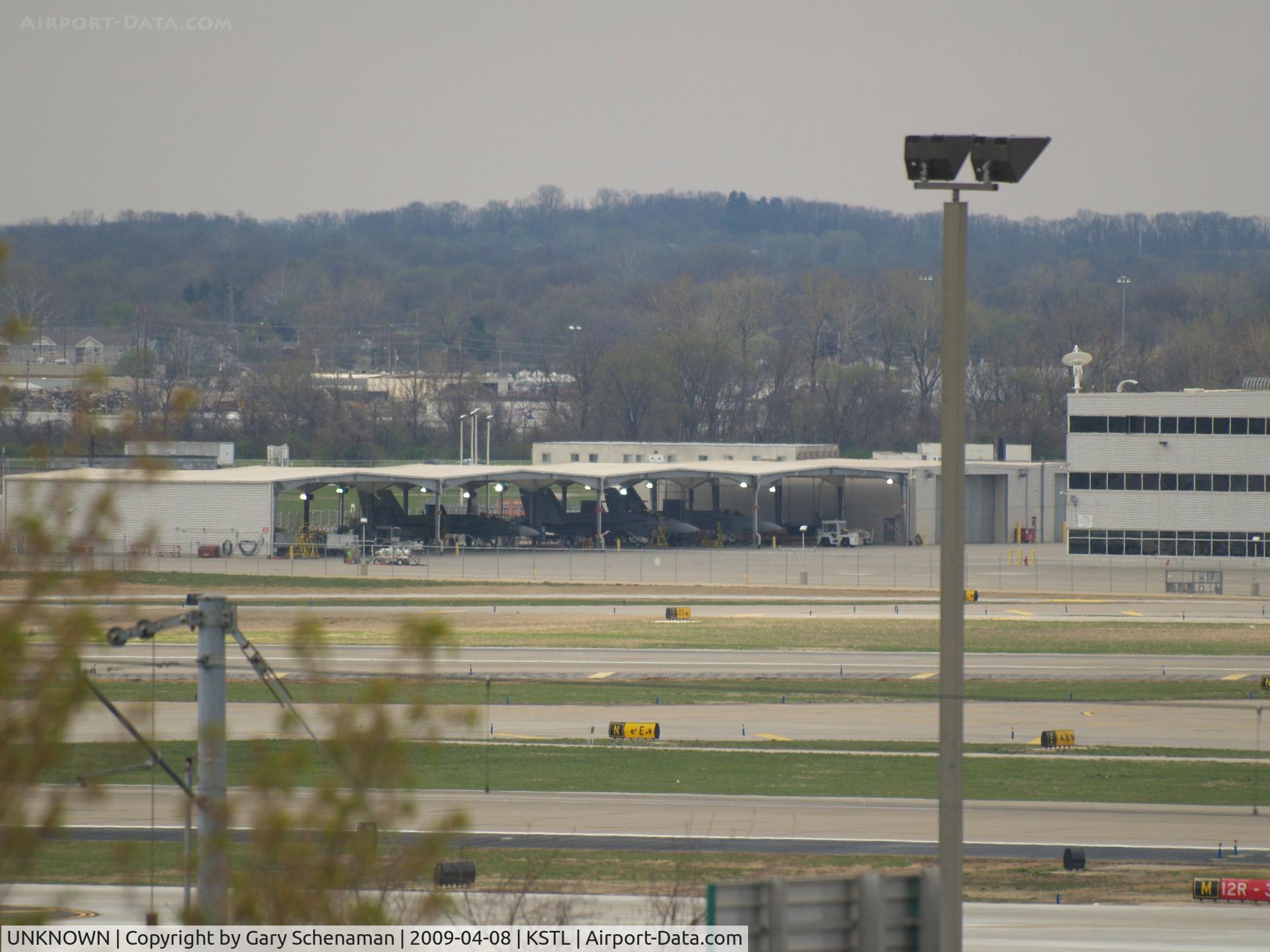 UNKNOWN, , 3 F-15'S UNDER OPEN HANGER