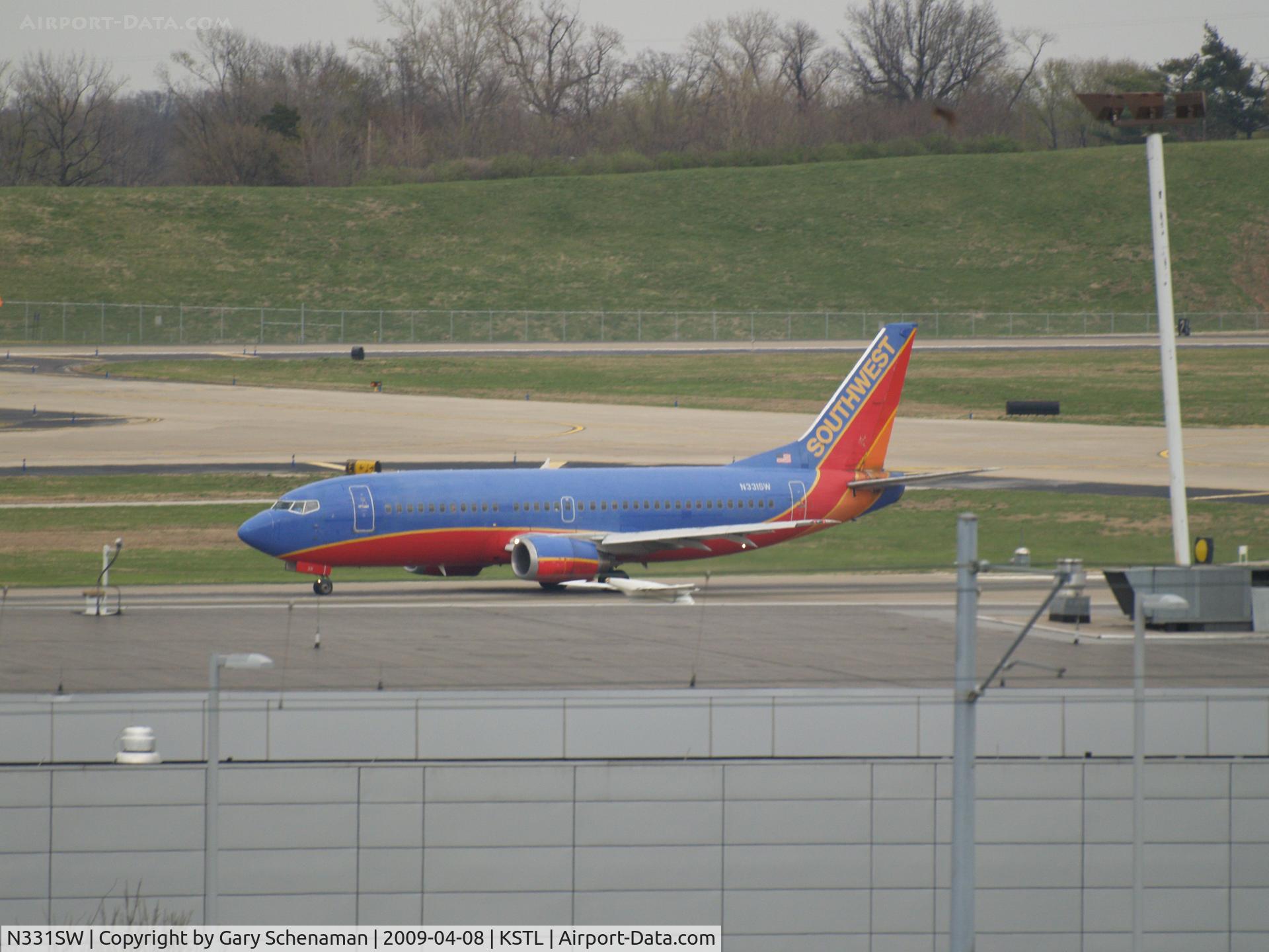 N331SW, 1988 Boeing 737-3H4 C/N 23695, TAKING OFF AT ST. LOUIS