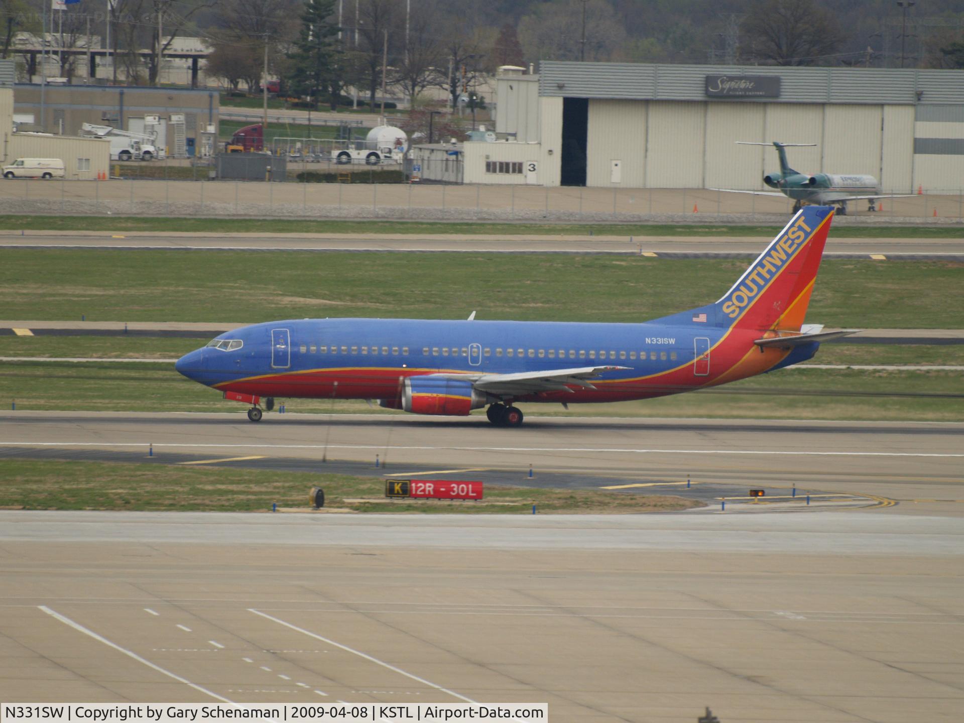 N331SW, 1988 Boeing 737-3H4 C/N 23695, TAKING OFF AT ST. LOUIS