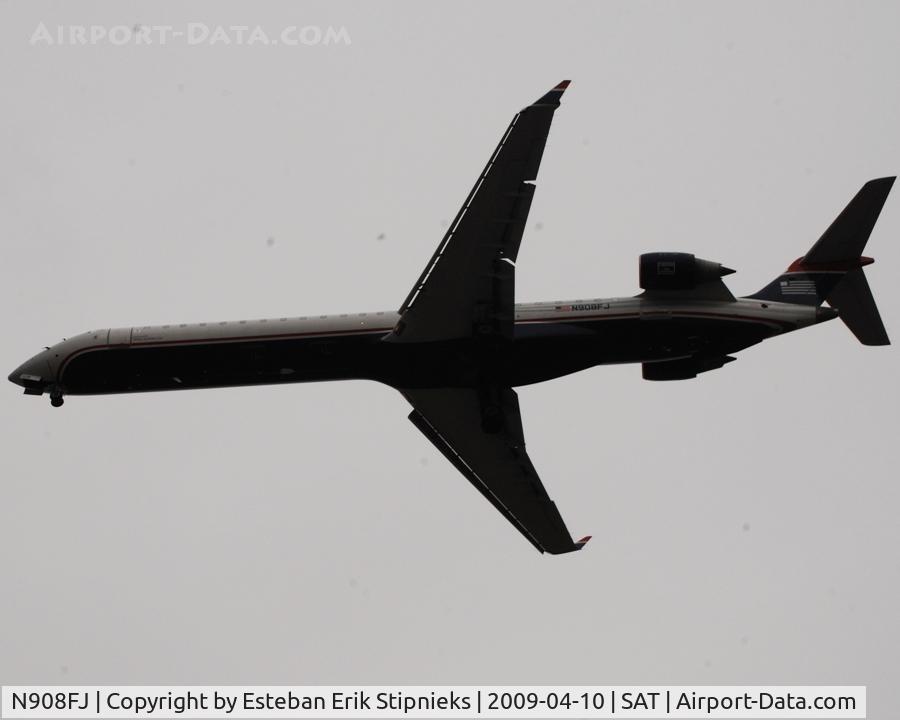 N908FJ, 2003 Bombardier CRJ-900ER (CL-600-2D24) C/N 15008, Approaching 03 about to cross 281 under a mile from the runway