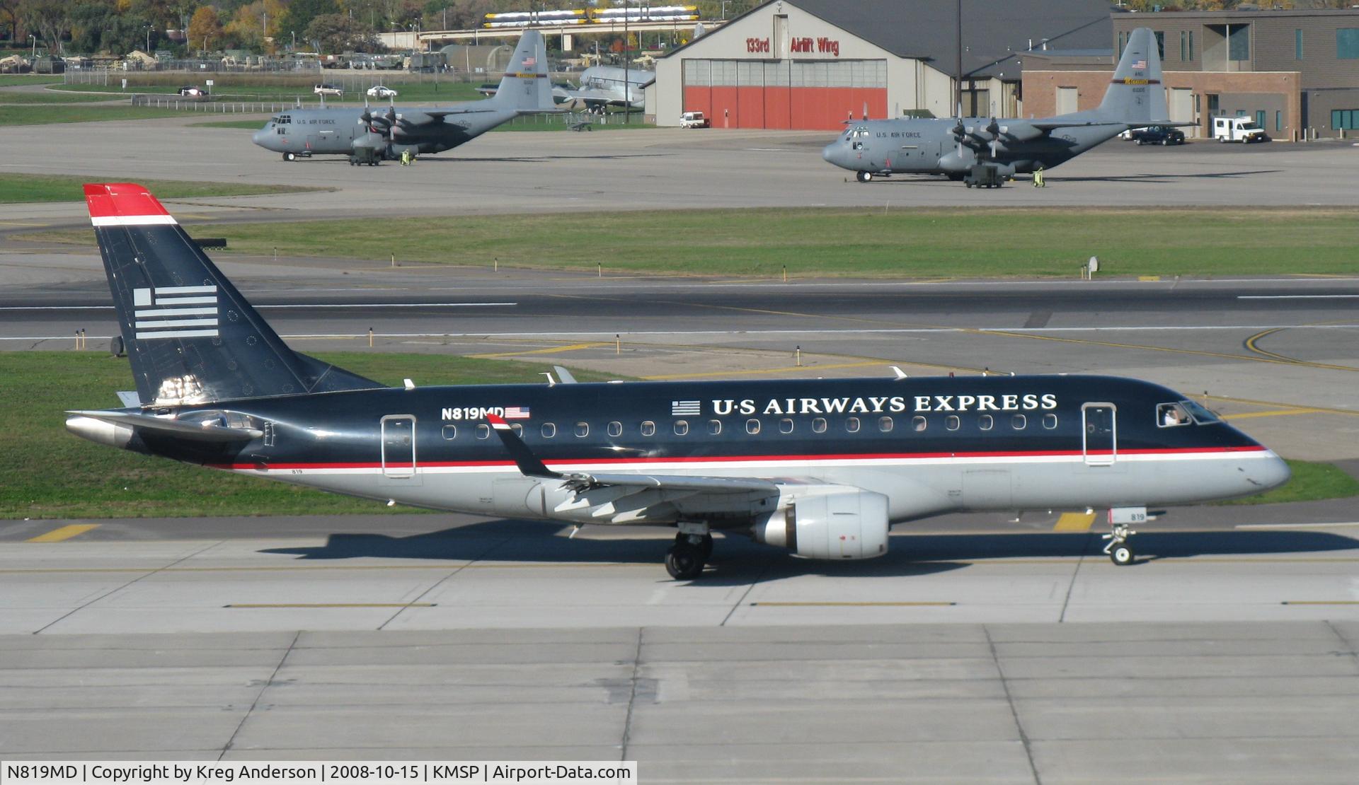 N819MD, 2004 Embraer 170SU (ERJ-170-100SU) C/N 17000040, Taxiing to active runway at MSP.
