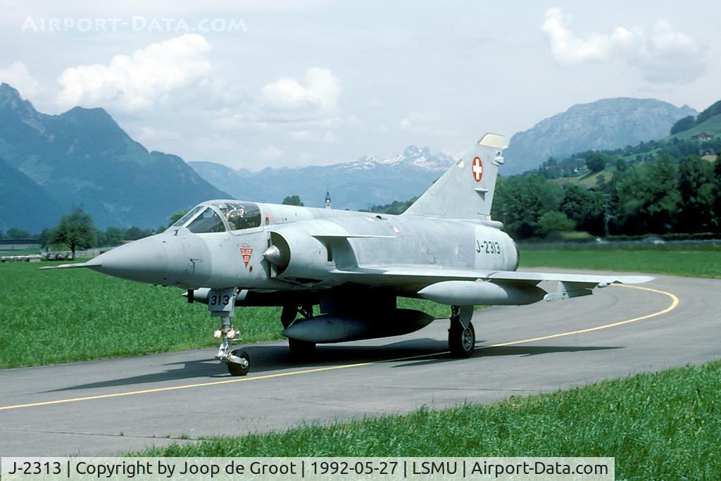 J-2313, Dassault (F+W Emmen) Mirage IIIS C/N 17-26-110, J-2313 is now preserved at the gate of Buochs. In 1992 it was seen taxiing to the runway. Times change...