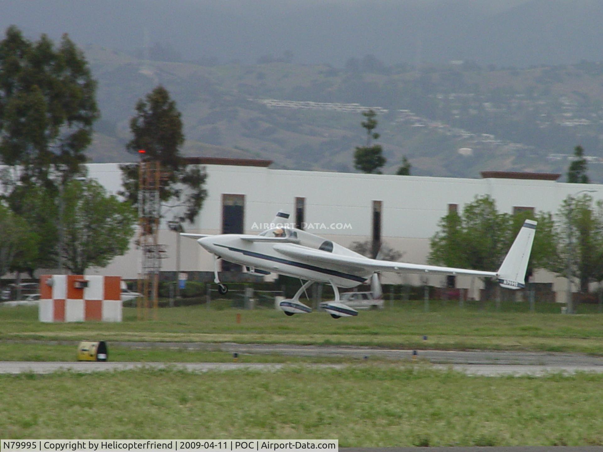 N79995, 1994 Rutan Long-EZ C/N 1897-L, Airborne westbound from 26L