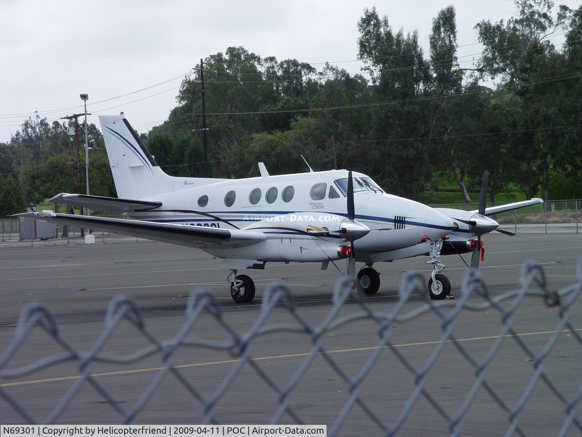 N69301, 1984 Beech C90 King Air C/N LJ-1079, Parked behind the fence at Brackett