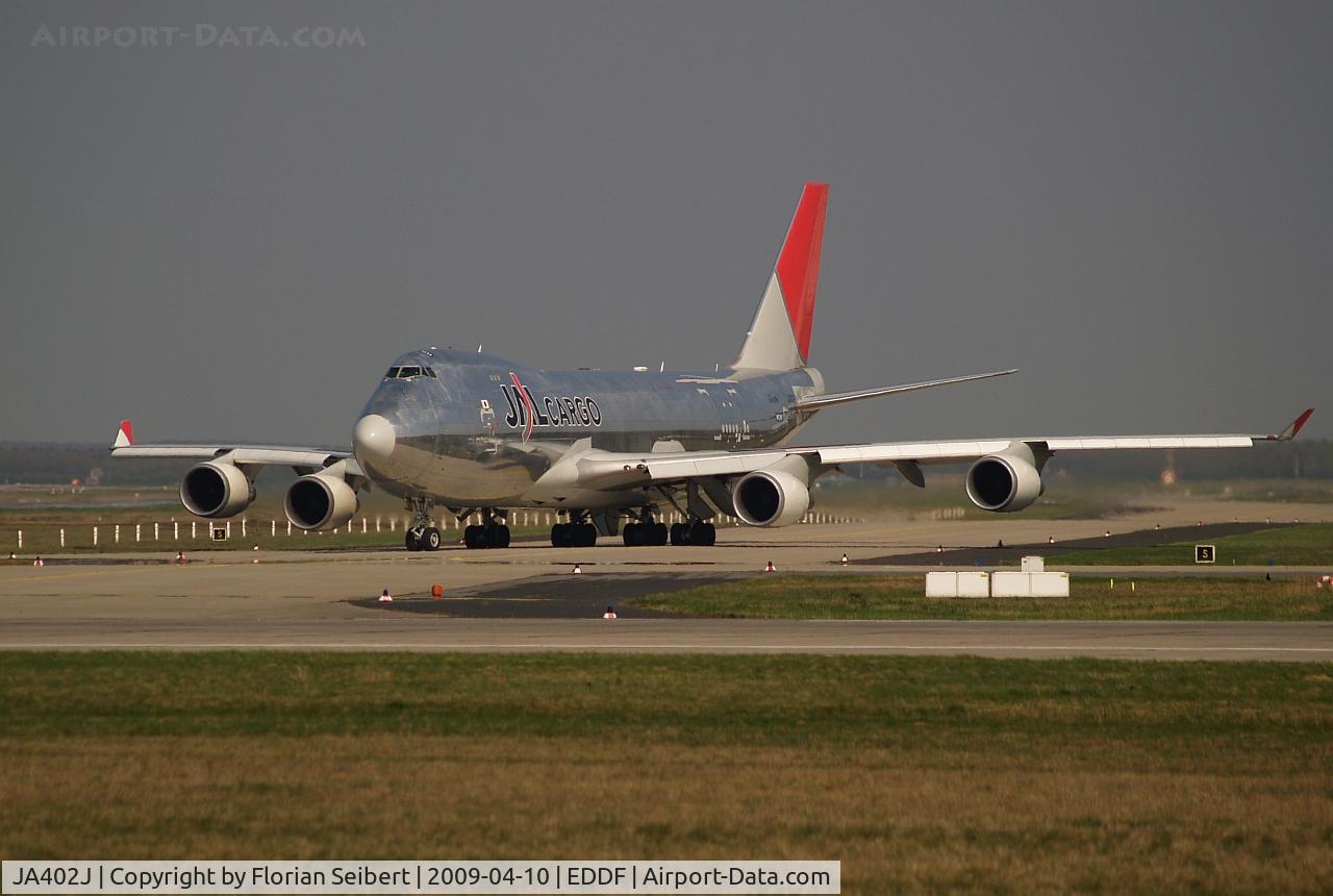 JA402J, 2004 Boeing 747-446F C/N 33749, on her way to rwy 07R