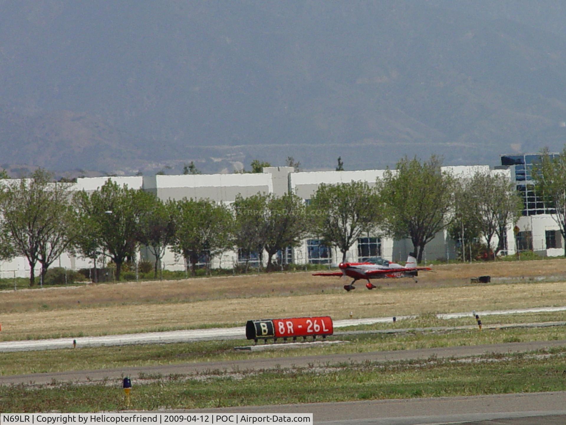N69LR, 2005 Extra EA-300/L C/N 1197, Starting to roll westbound, tail is up