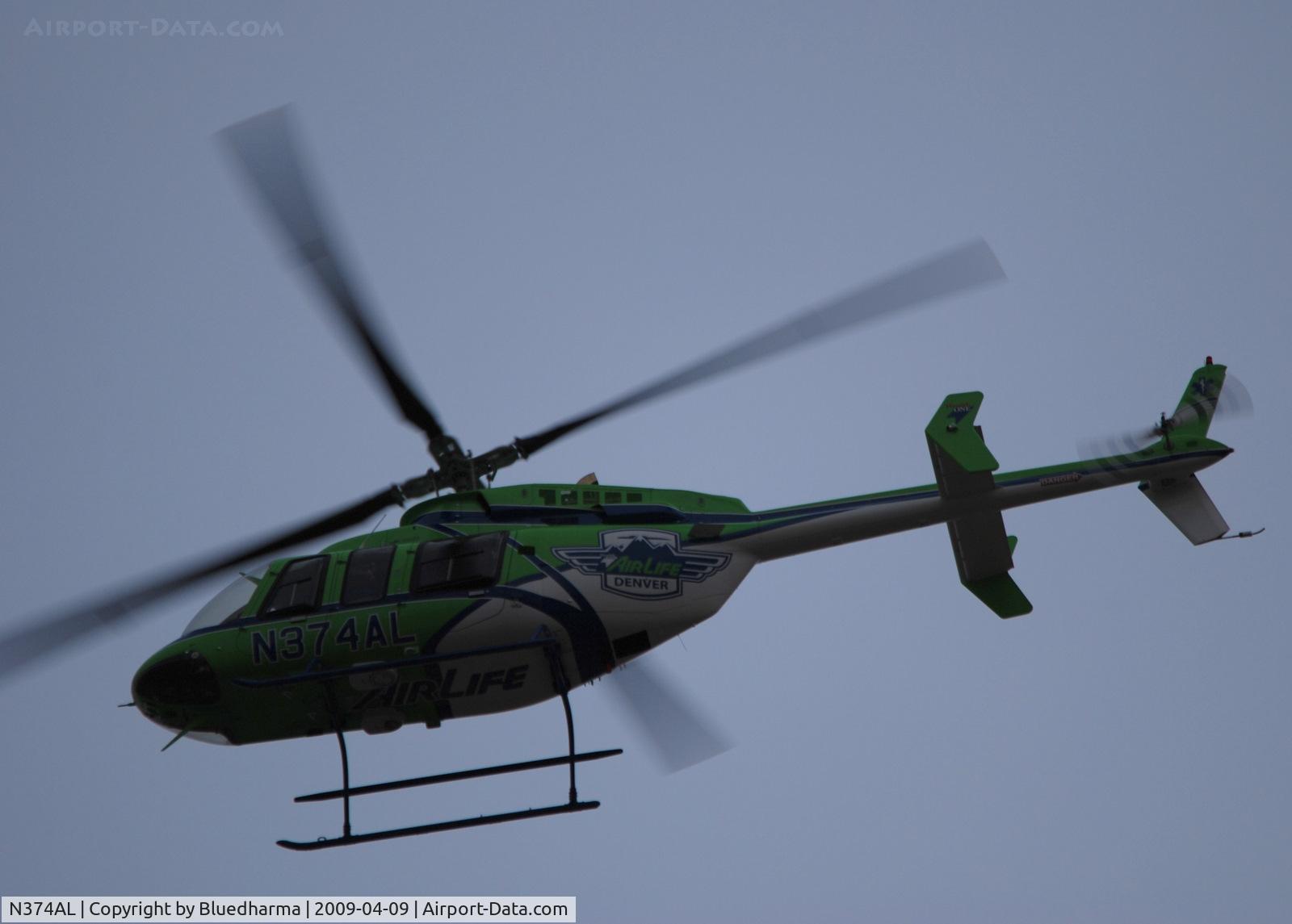 N374AL, 2008 Bell 407 C/N 53819, Flying over Columbine High School Littleton, Colorado