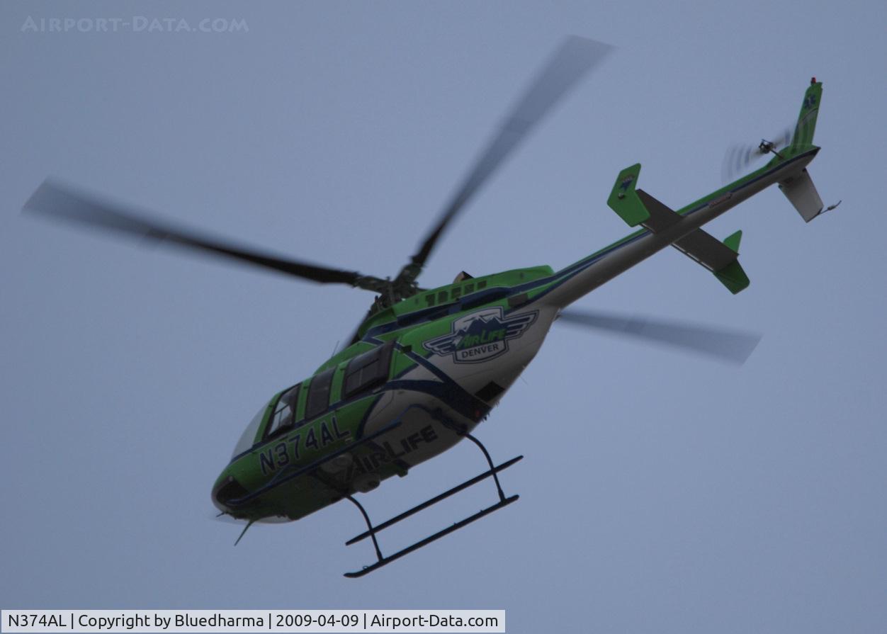 N374AL, 2008 Bell 407 C/N 53819, Flying over Columbine High School Littleton, Colorado