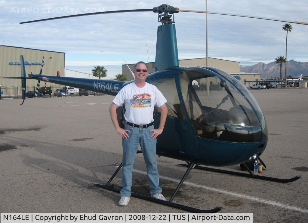 N164LE, 2001 Robinson R22 BETA C/N 3164, N164LE parked at base of tower, TUS