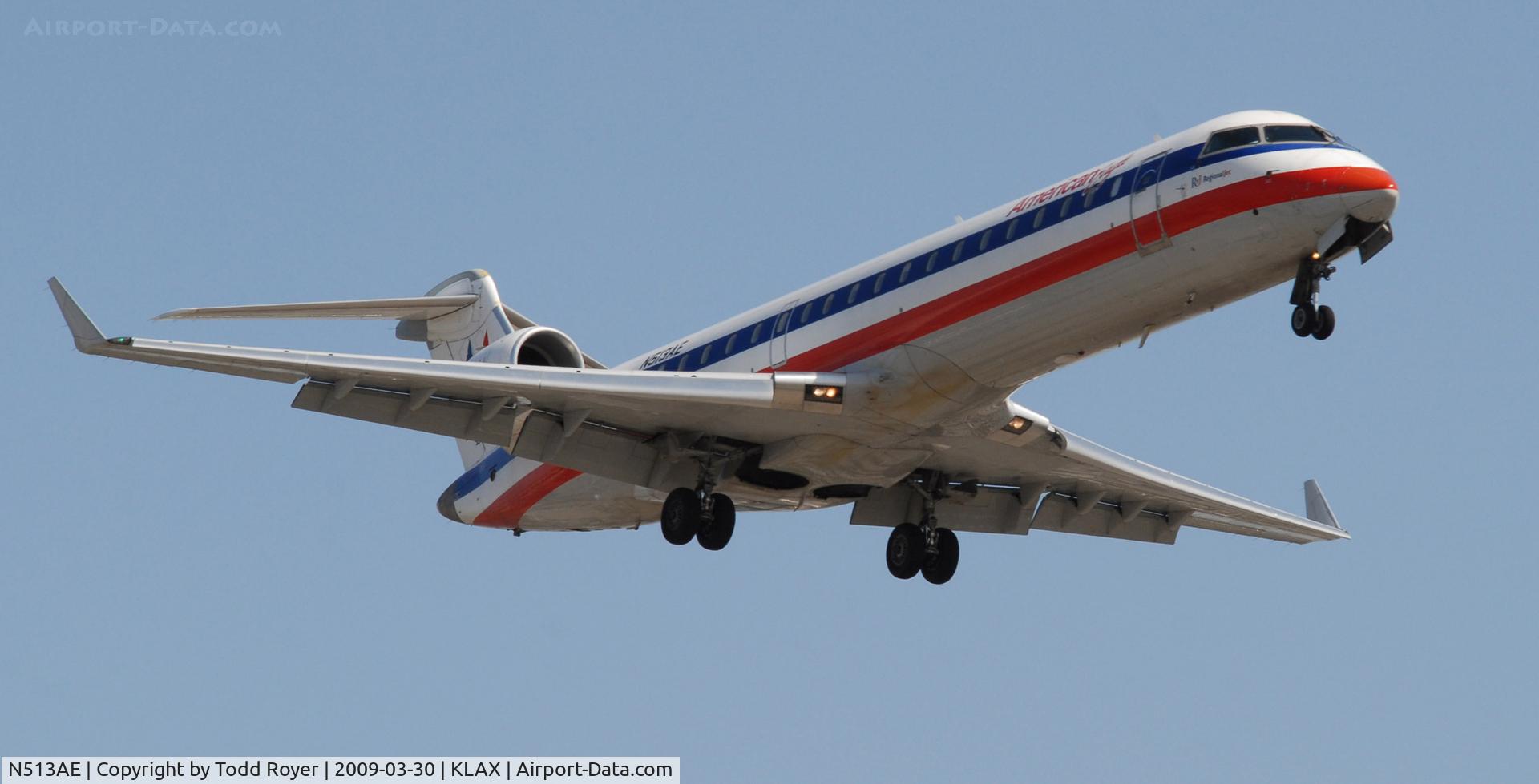 N513AE, 2003 Bombardier CRJ-701 (CL-600-2C10) Regional Jet C/N 10114, Landing 24R at LAX