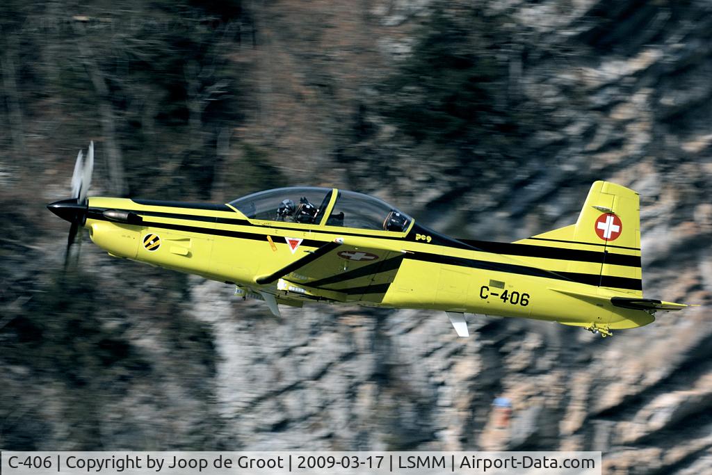 C-406, Pilatus PC-9 C/N 214, After take off this PC-9 remained very low over the runway. A spectaculair sight!