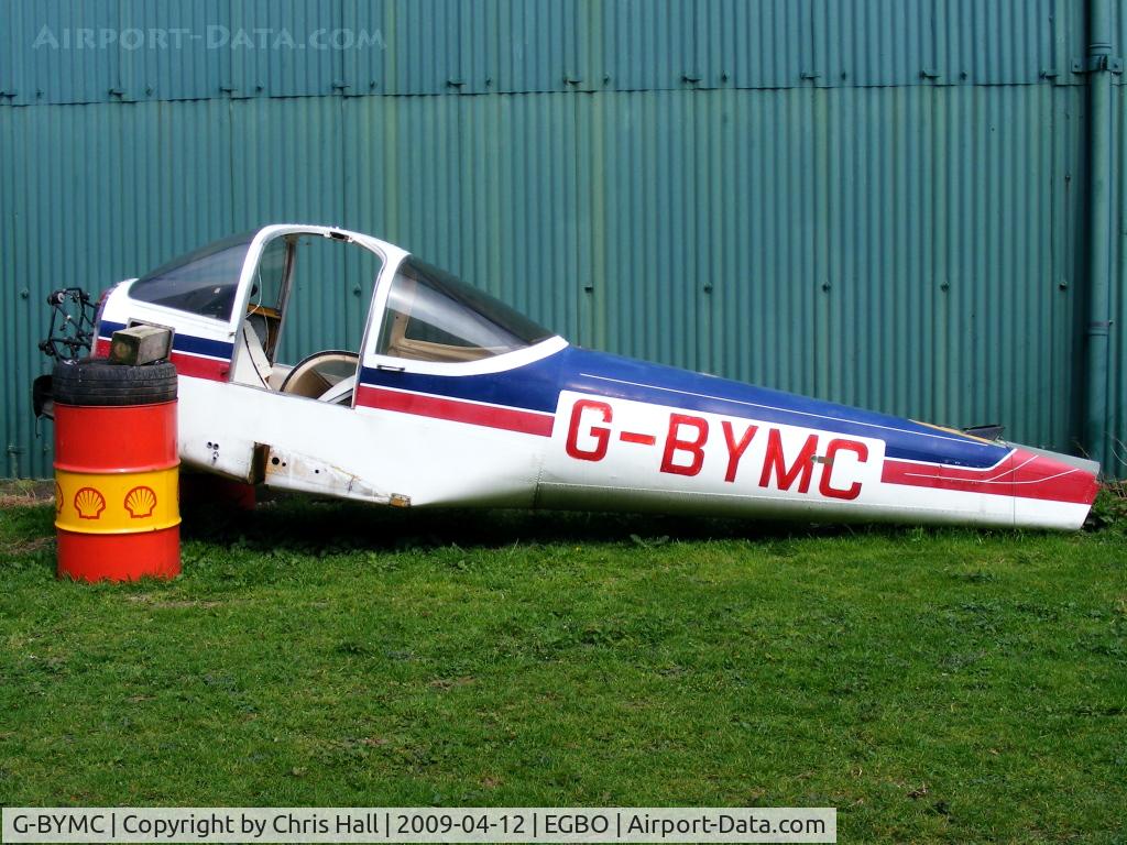 G-BYMC, 1982 Piper PA-38-112 Tomahawk Tomahawk C/N 38-82A0034, remains of G-BYMC between the hangars at Halfpenny Green
