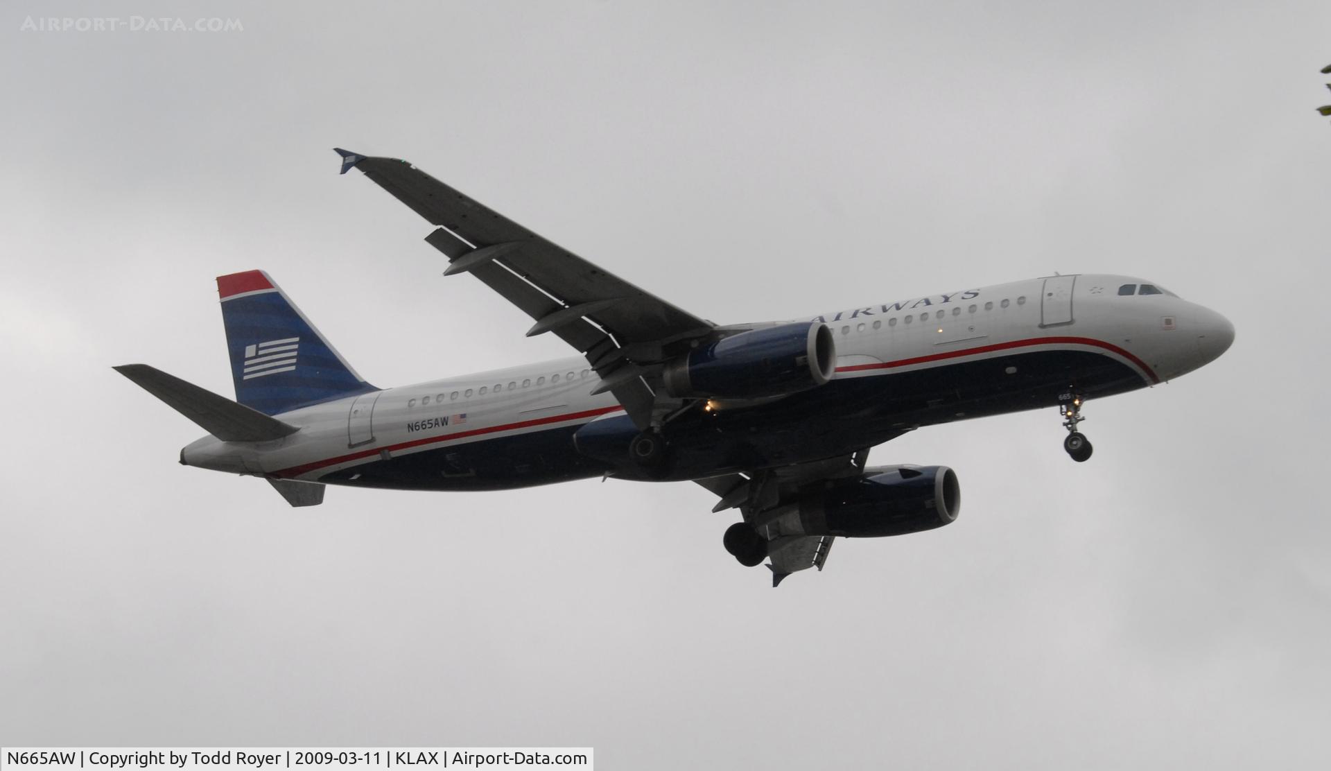 N665AW, 2001 Airbus A320-232 C/N 1644, Landing 24R at LAX