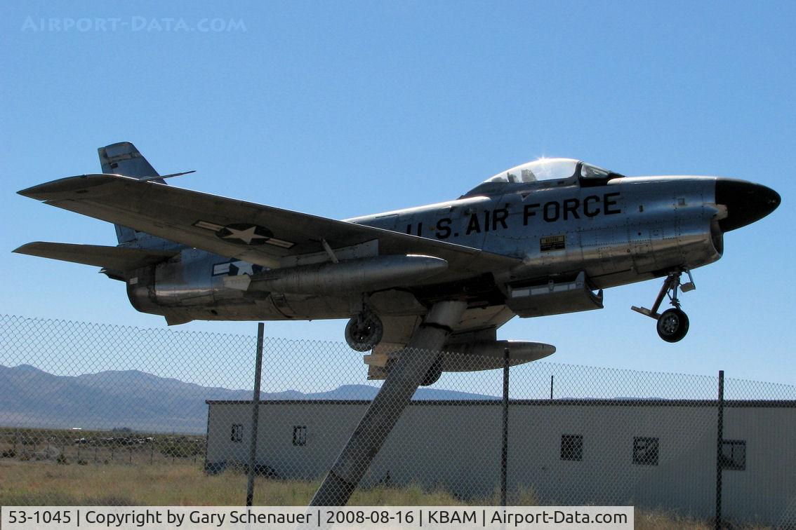 53-1045, North American F-86F Sabre C/N 201-489, Its days of glory long over, this North American F86L Sabre now sits atop a pedestal in an untended, weed-filled, fenced off field adjacent to the Lander County Airport (KBAM ~ Battle Mountain, Nevada) and slowly fades away in the blazing Nevada sun.
