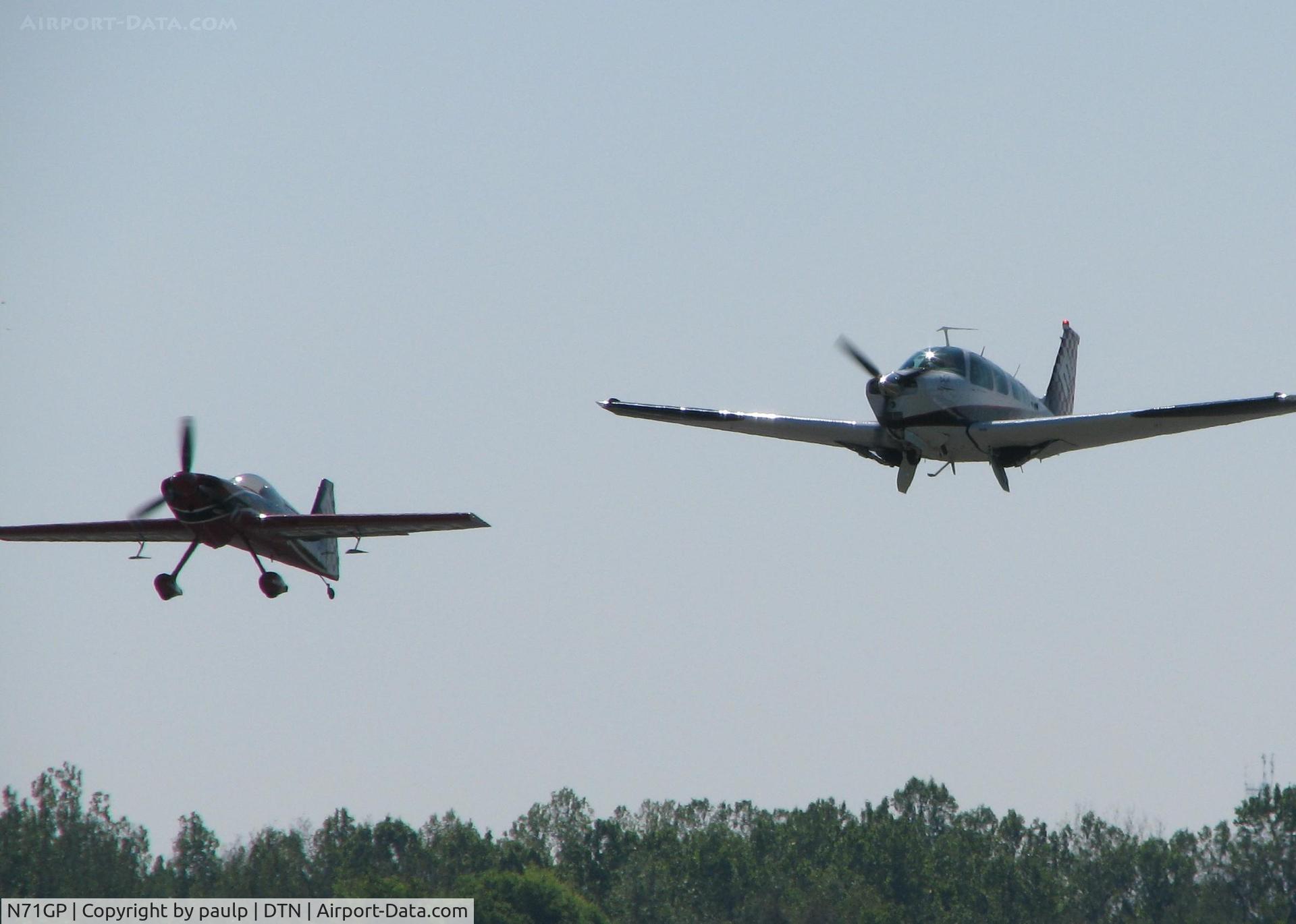 N71GP, 2007 MX Aircraft MX2 C/N 5, Taking off from 32 at the Shreveport Downtown airport. The Bonanza, N6066S, I assume is part of the Greg Poe Airshow crew/support since they take off together and they have the same markings. duh!