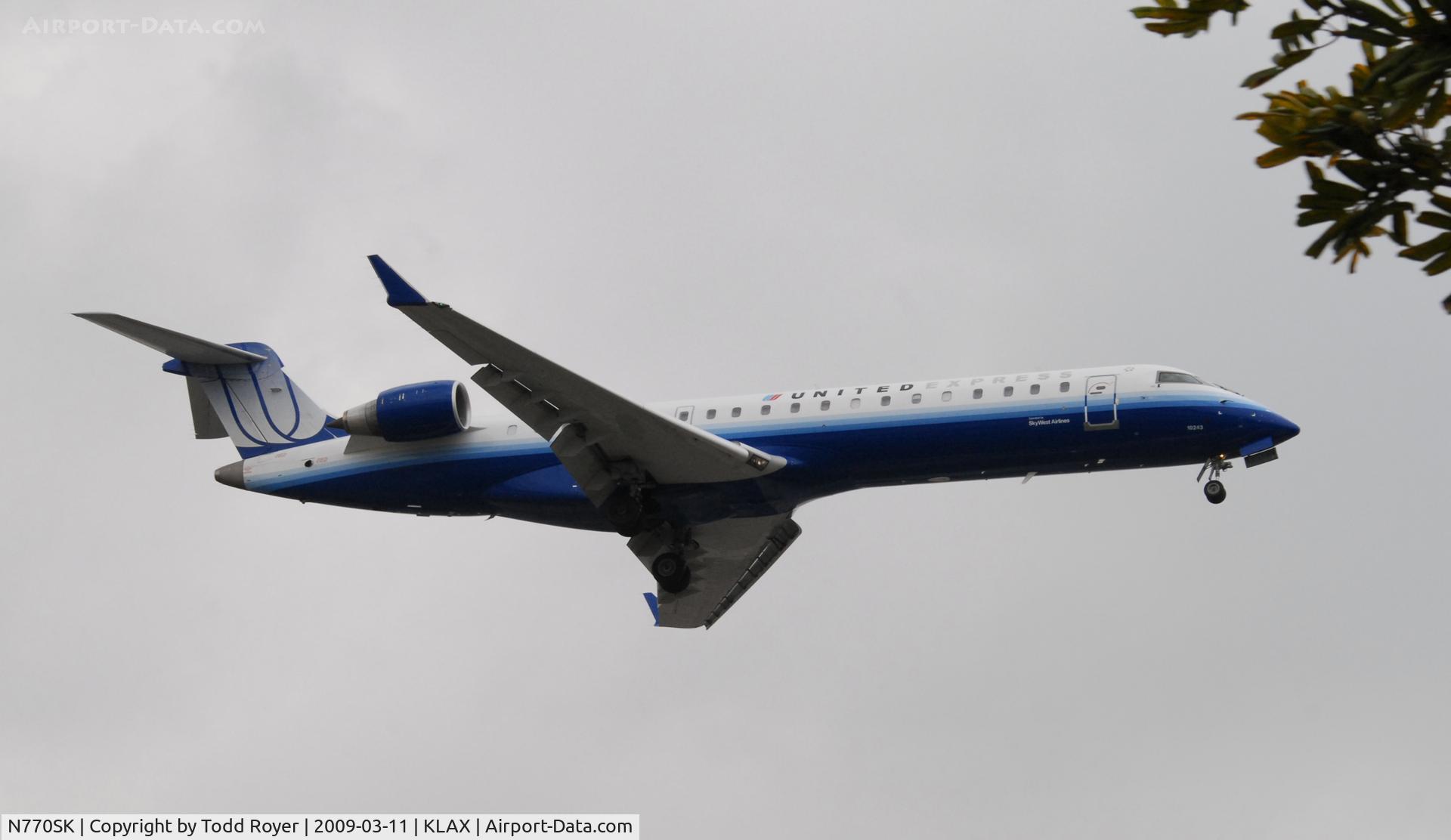 N770SK, 2006 Canadair CL-600-2C10 Regional Jet CRJ-700 C/N 10243, Landing 24R at LAX