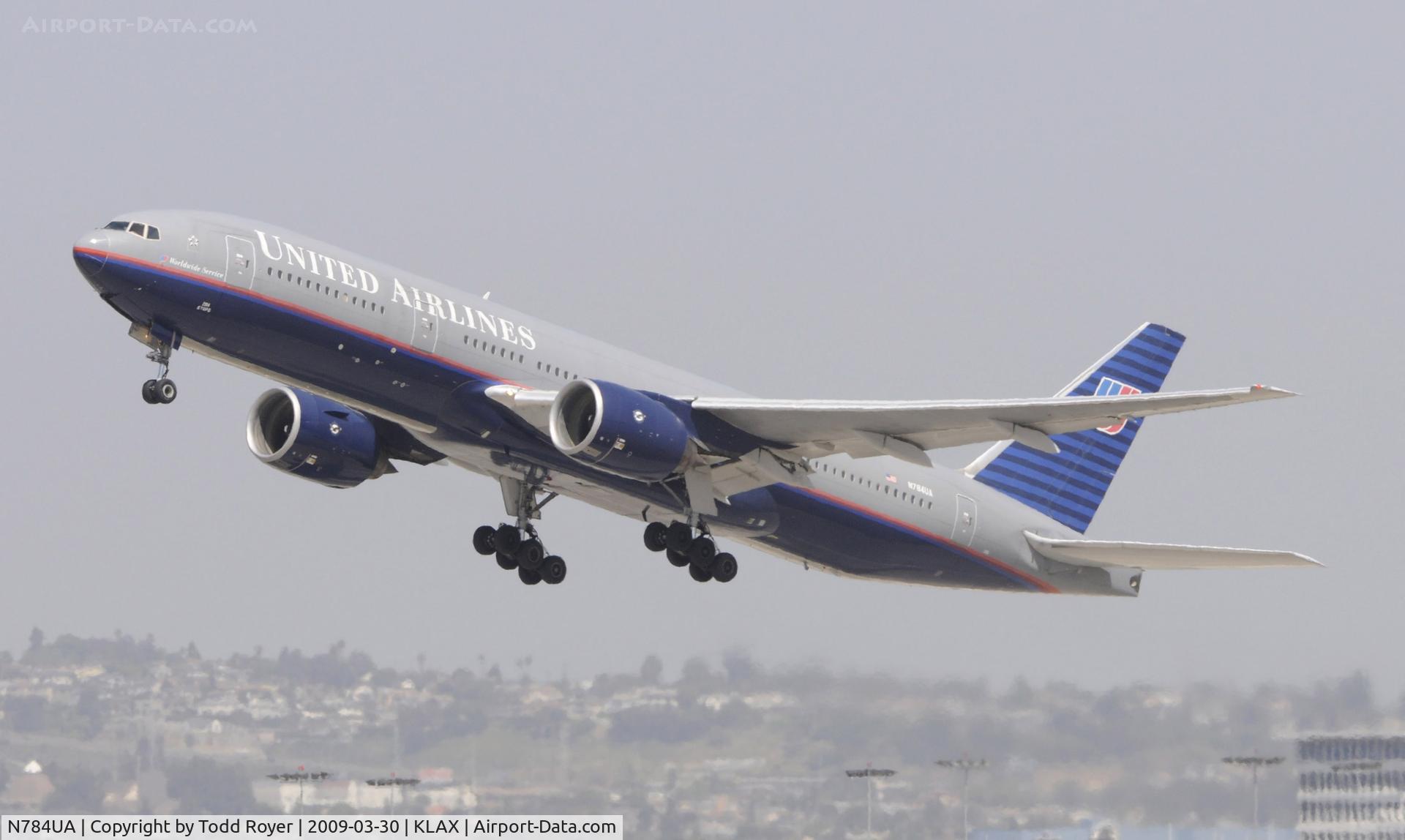 N784UA, 1997 Boeing 777-222/ER C/N 26951, Departing LAX on 25R