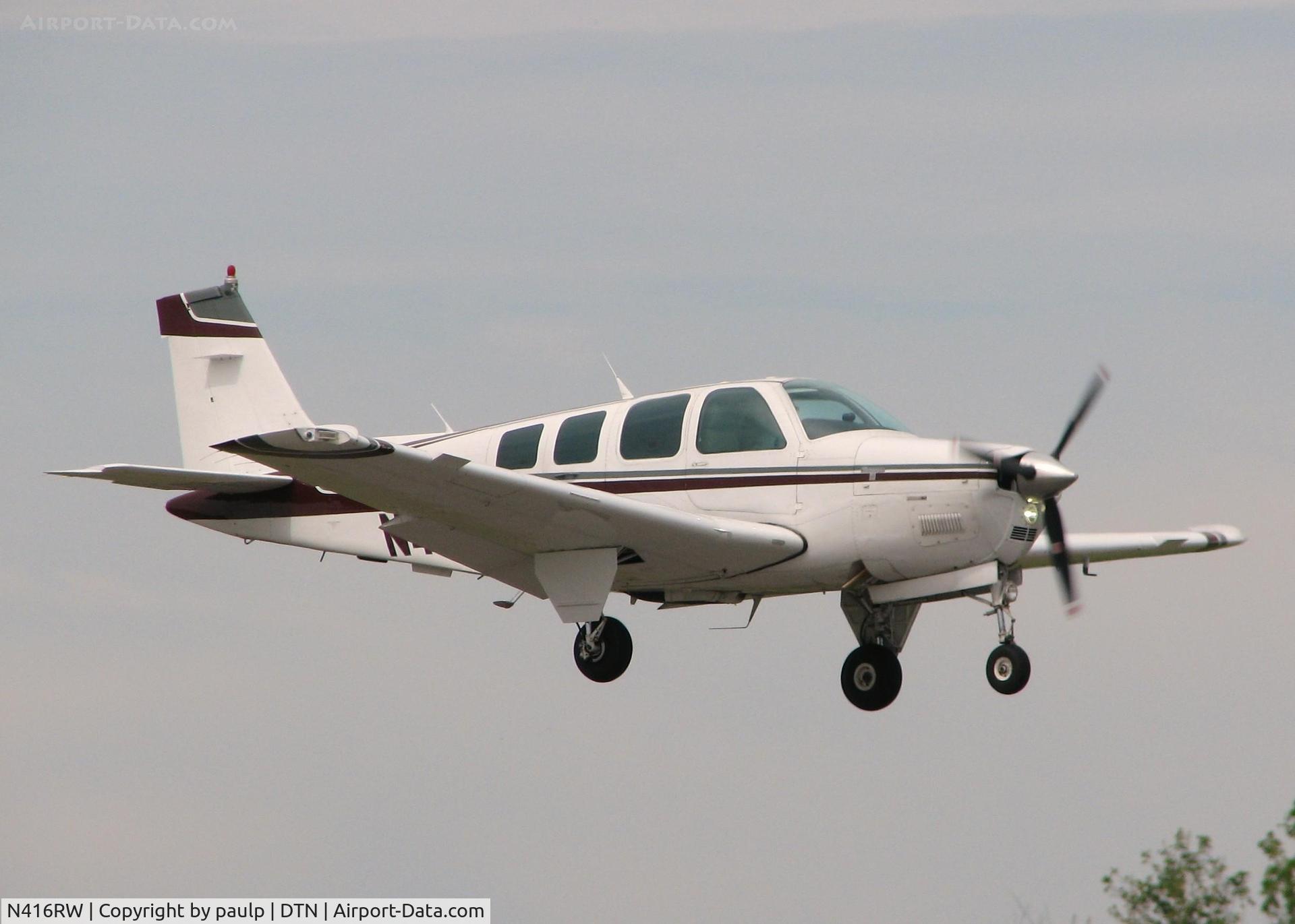 N416RW, 1984 Beech A36 Bonanza 36 C/N E-2133, About to touch down on 14 at the Shreveport Downtown airport.