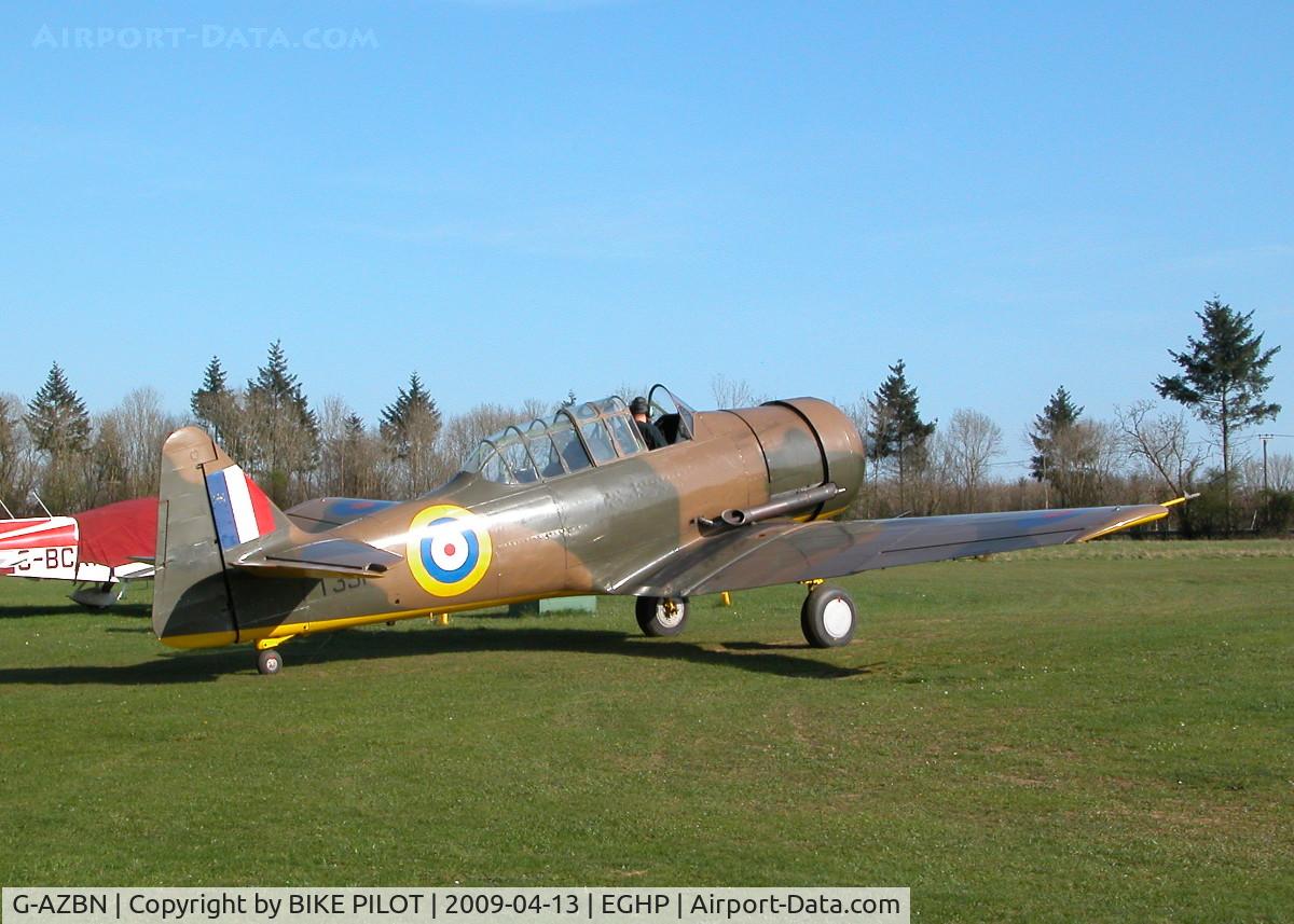 G-AZBN, 1942 Noorduyn AT-16 Harvard IIB C/N 14A-1431, TAXYING BACK TO THE CLUB HOUSE AFTER TAKING ON FUEL