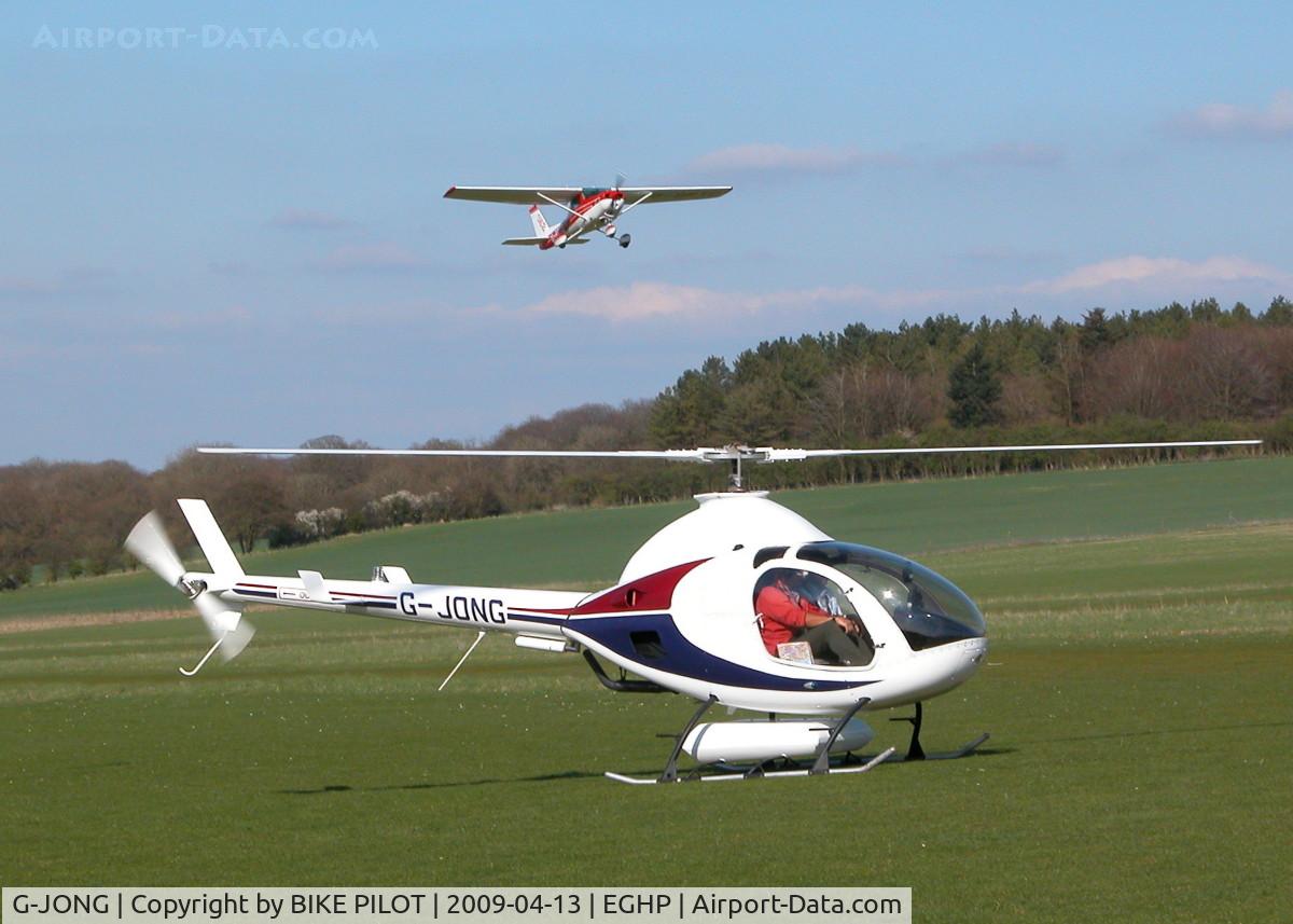G-JONG, 2004 Rotorway Exec 162F C/N 6168, RUNNING UP WITH CESSNA 152 G-BRTD JUST AIRBOURNE FROM RWY 21