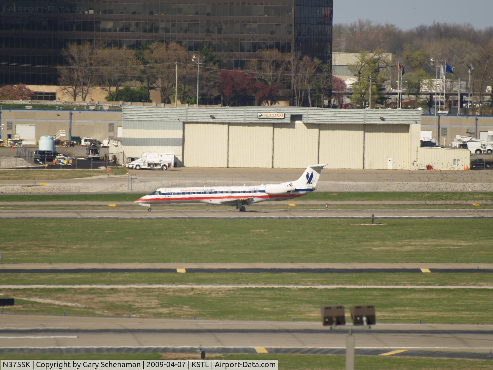 N375SK, 2002 Embraer ERJ-140LR (EMB-135KL) C/N 145569, JUST LANDED AT THE FAR END OF ST. LOUIS