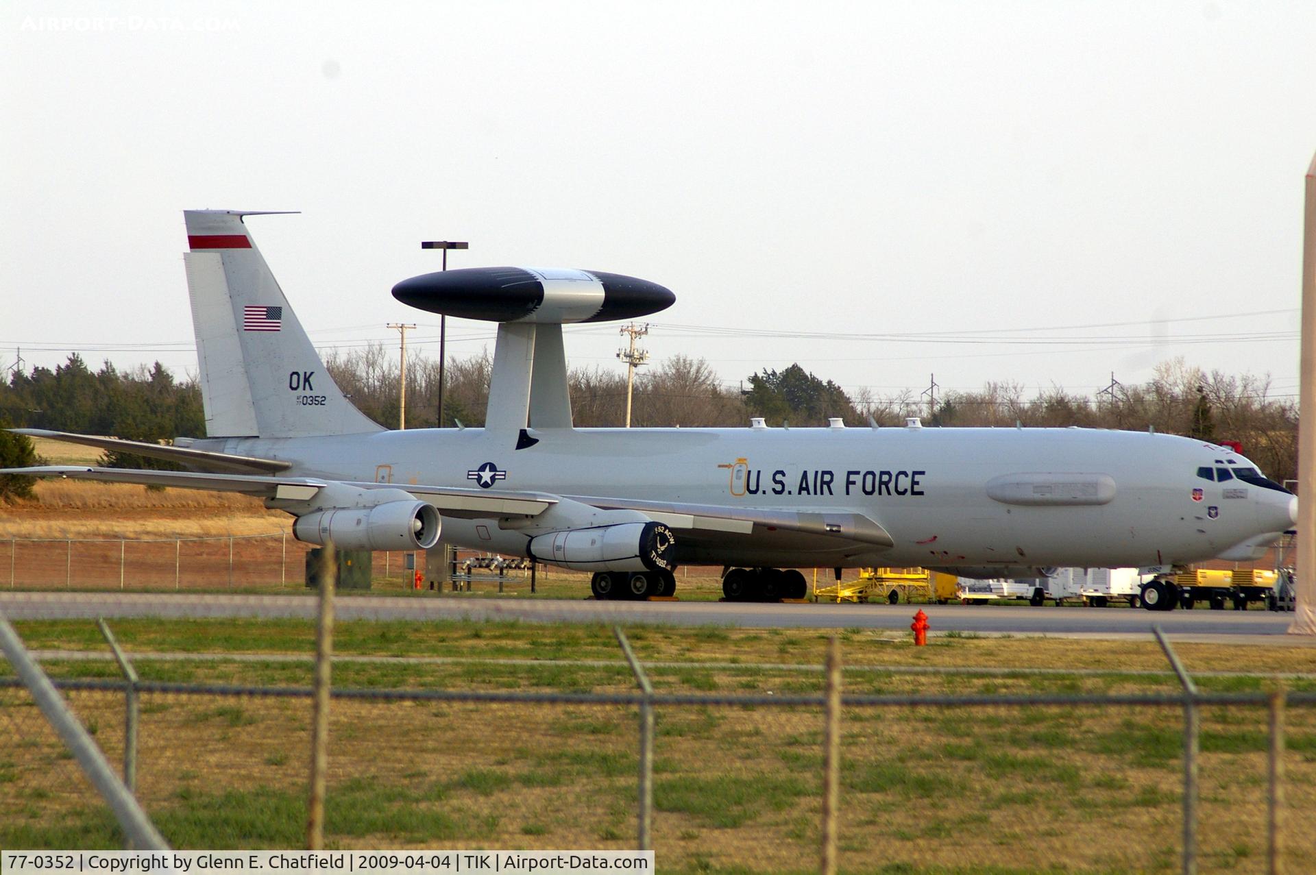 77-0352, 1977 Boeing E-3B Sentry C/N 21552, Driving along the east side of the base, this was seen from the road with the nose just behind the hangar