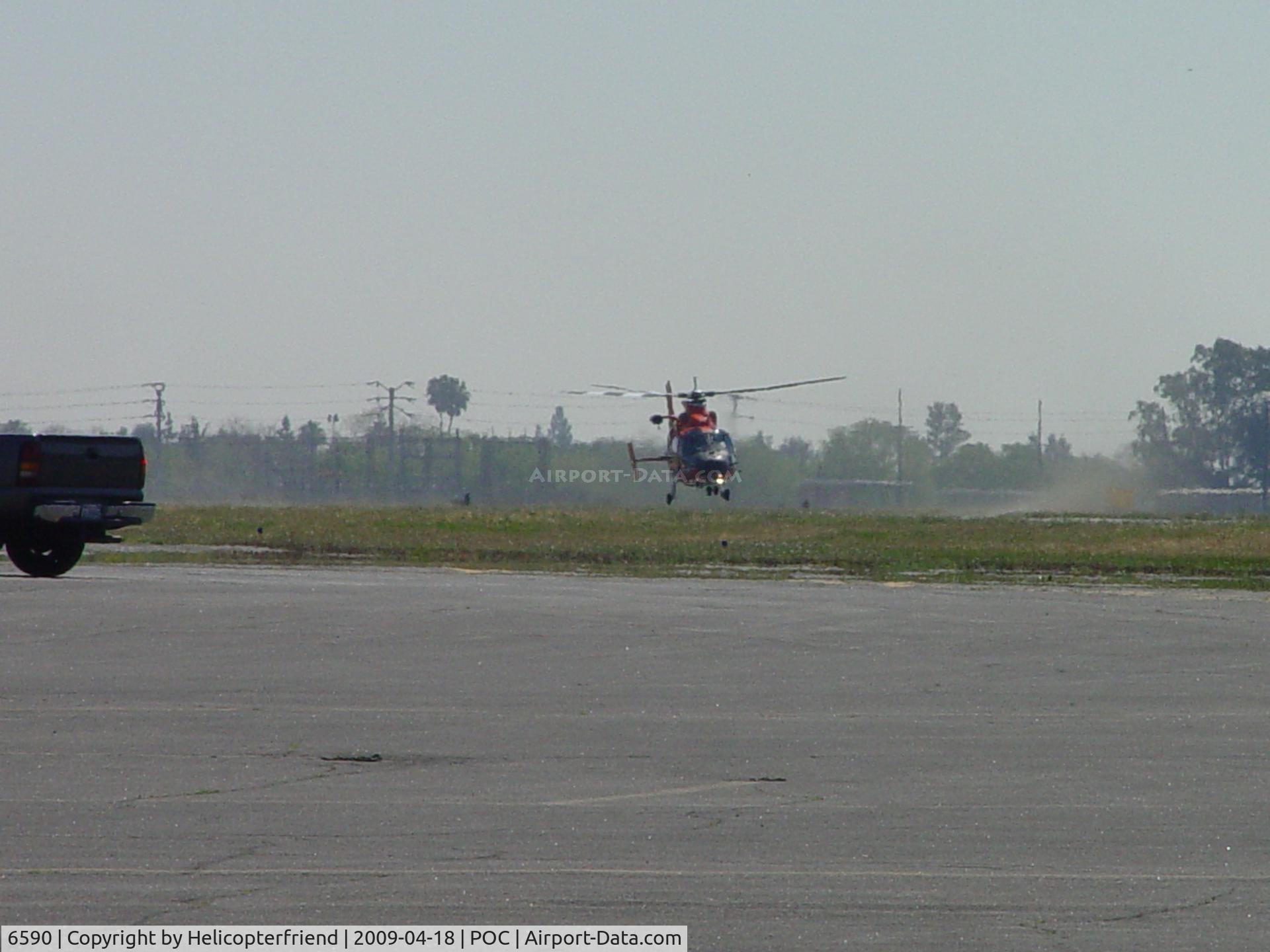 6590, Aerospatiale HH-65A Dolphin C/N 6291, USCG Dolphin HH 65C almost touching down and sweeping runway 26R