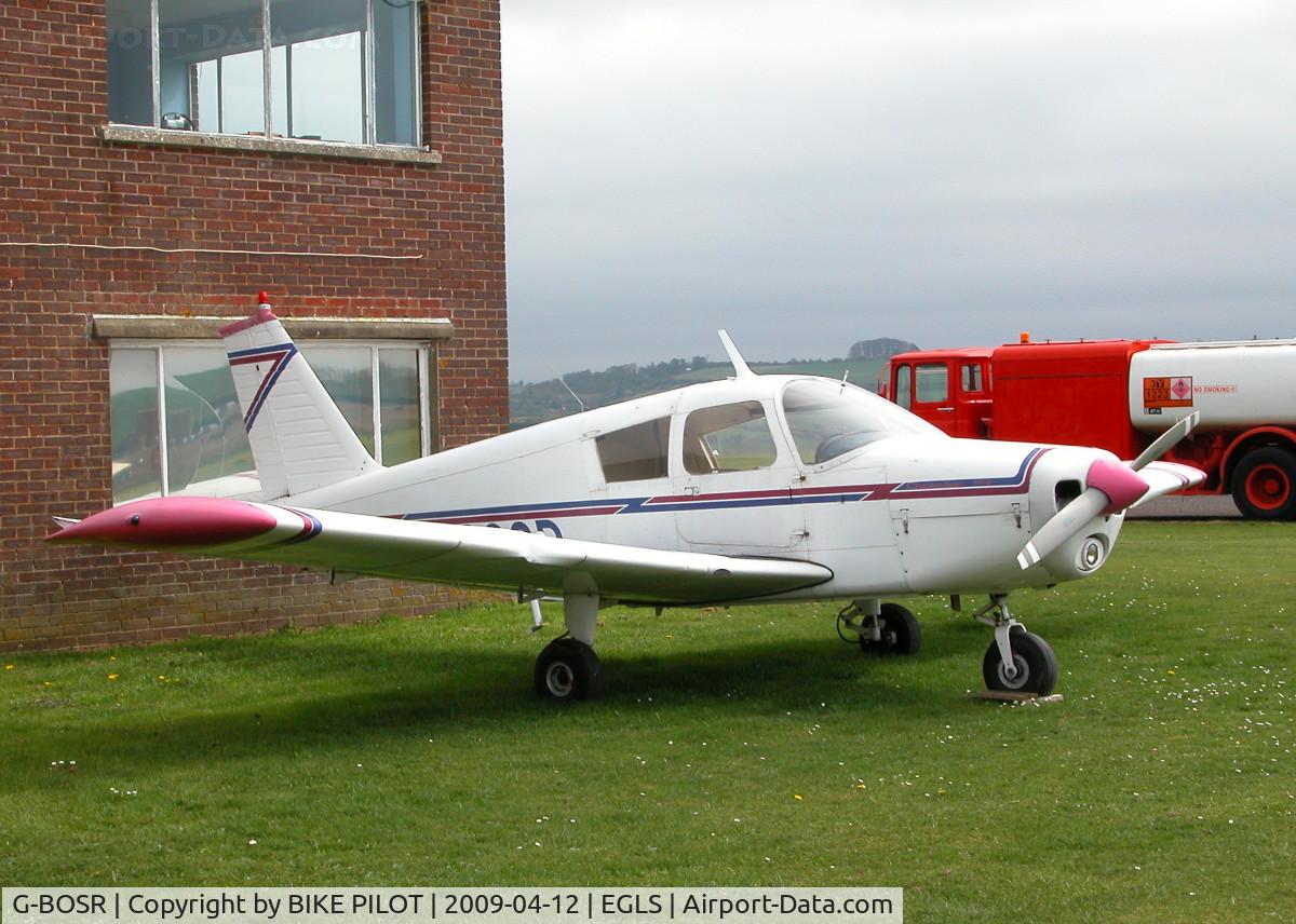 G-BOSR, 1966 Piper PA-28-140 Cherokee C/N 28-22092, WHILST TAKING OFF WITH A PUPIL PILOT THIS A/C WAS CAUGHT BY A STRONG CROSS WIND AND LEFT THE RUNWAY HITTING A FENCE CAUSING DAMAGE TO BOTH WINGS