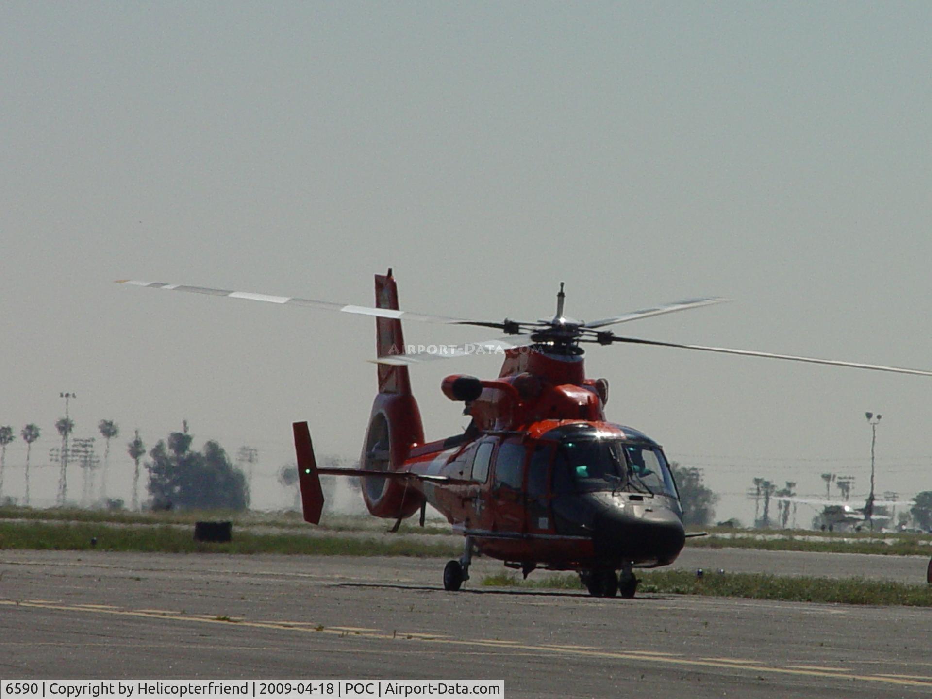 6590, Aerospatiale HH-65A Dolphin C/N 6291, USCG Dolphin HH 65C crossing taxiway to parking apron
